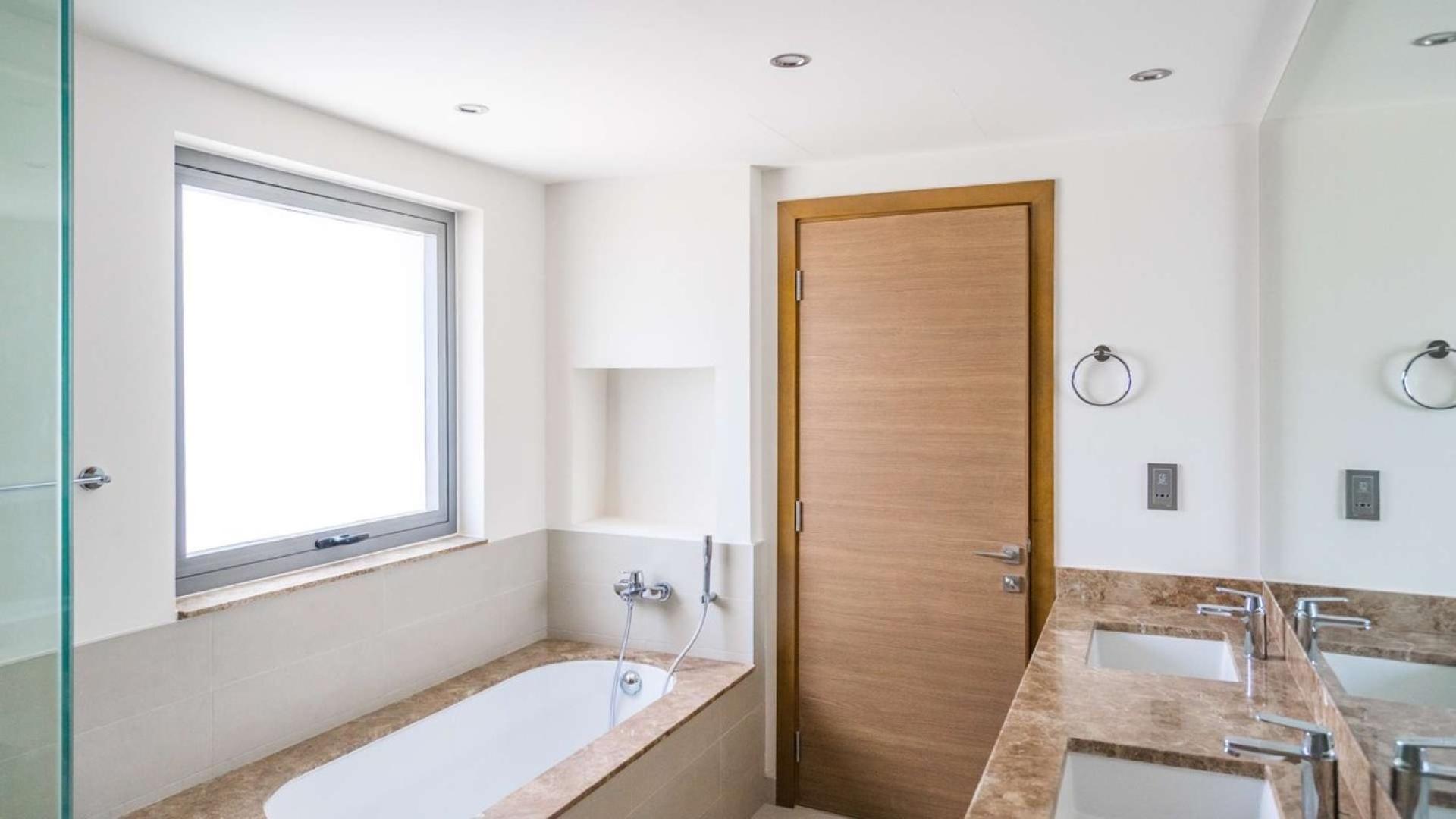 Modern kitchen and staircase in Type 1 Villa, Sidra 3, Dubai Hills Estate