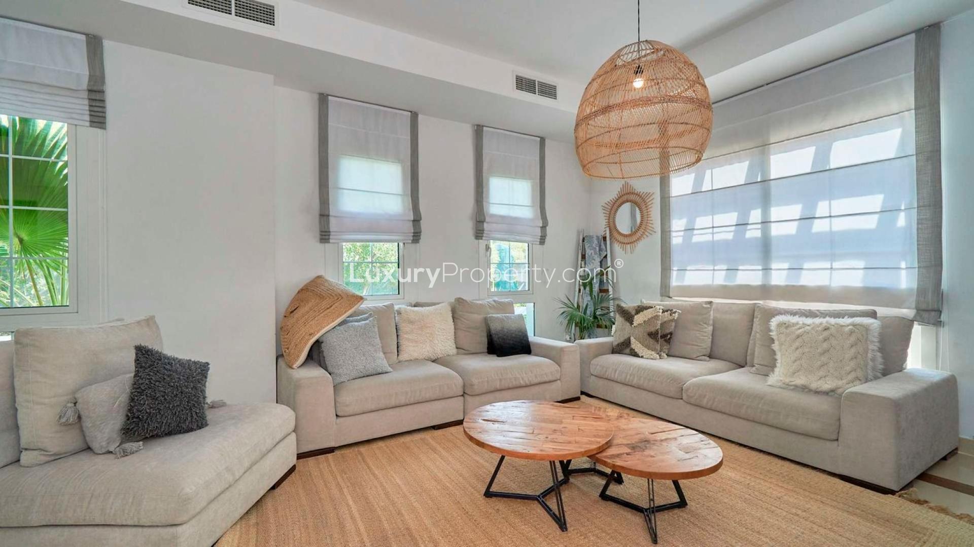 Bright living room in upgraded Rahat villa, Mudon, with modern decor and natural light