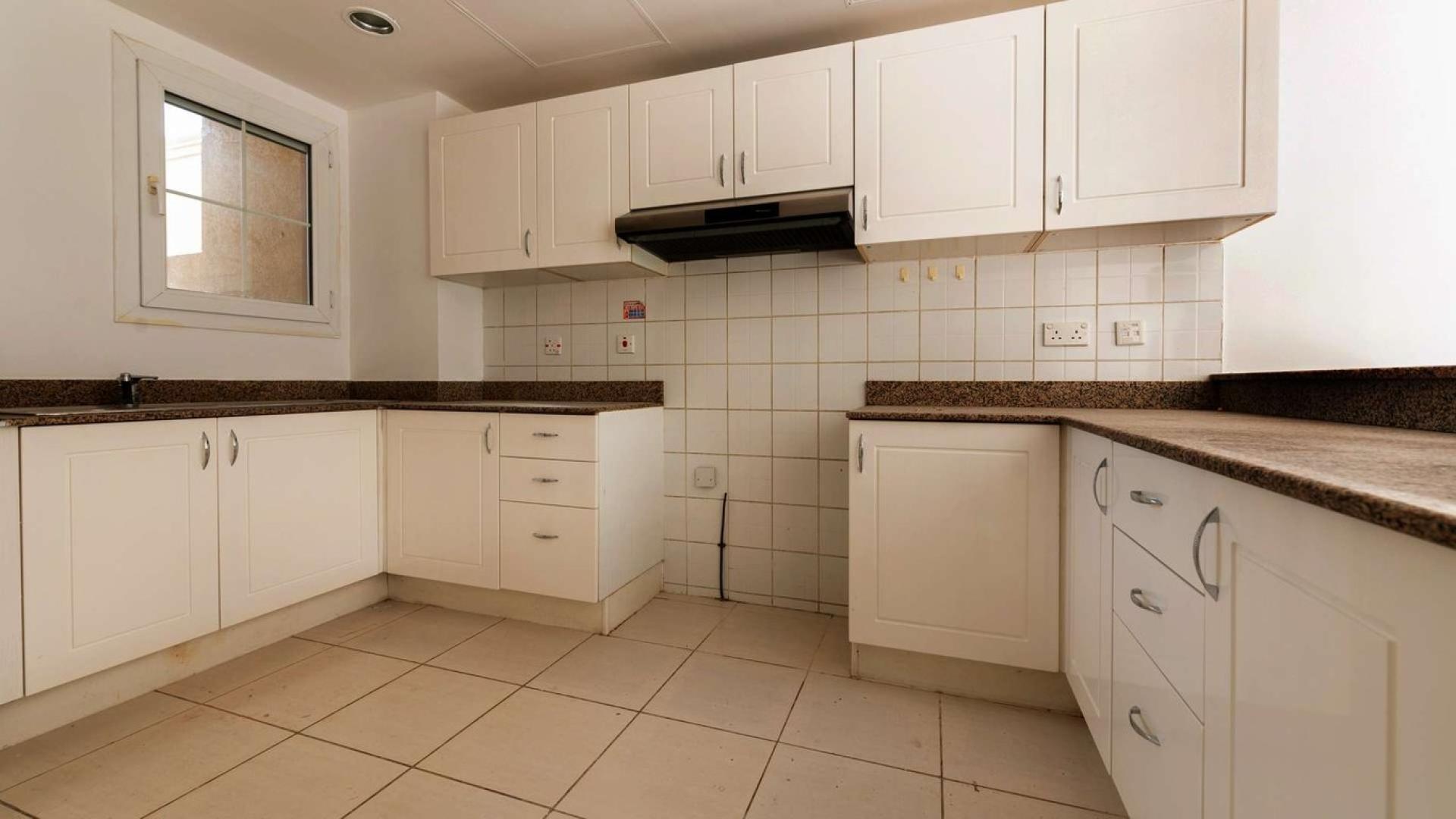 Stunning villa exterior with lush lawn in The Springs, 3-bedroom, 4-bathroom for sale