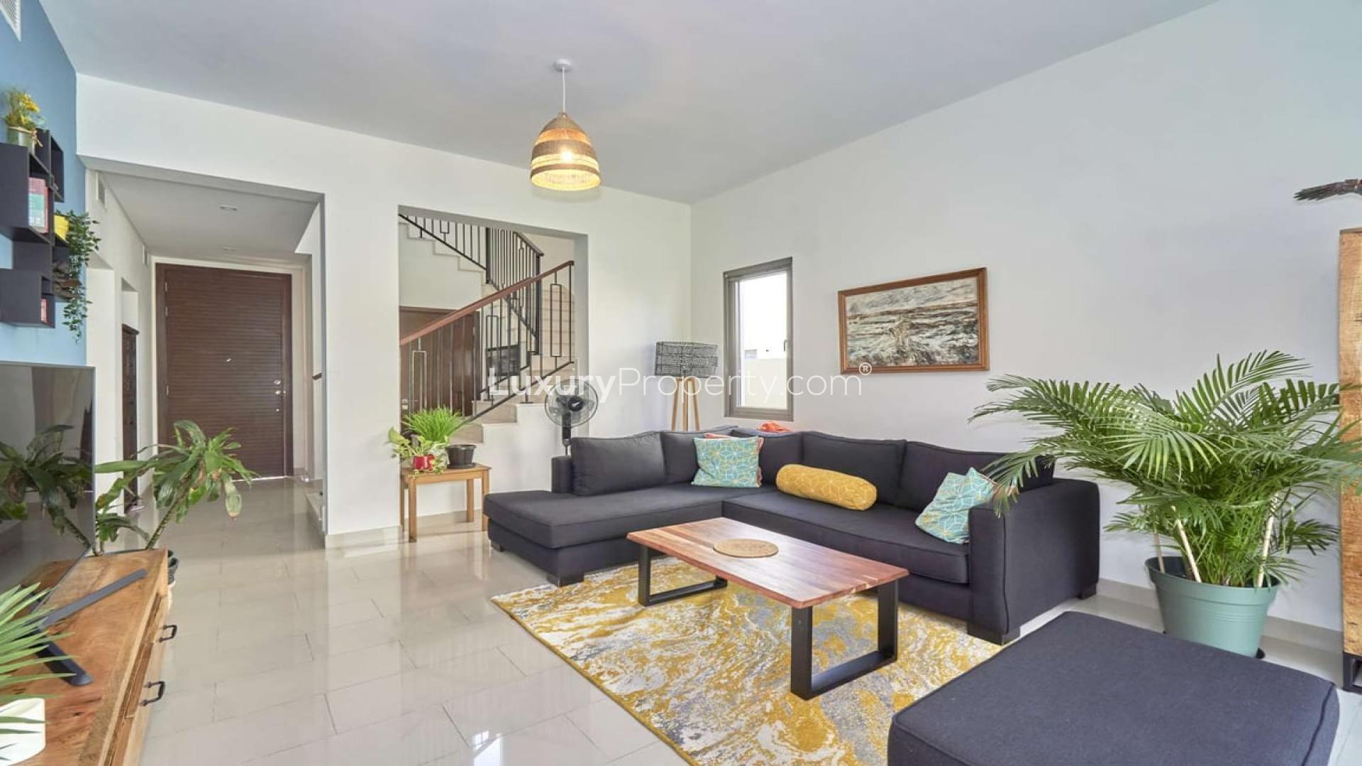 Brand new 3-bedroom villa living room with garden view in Azalea, Arabian Ranches 2