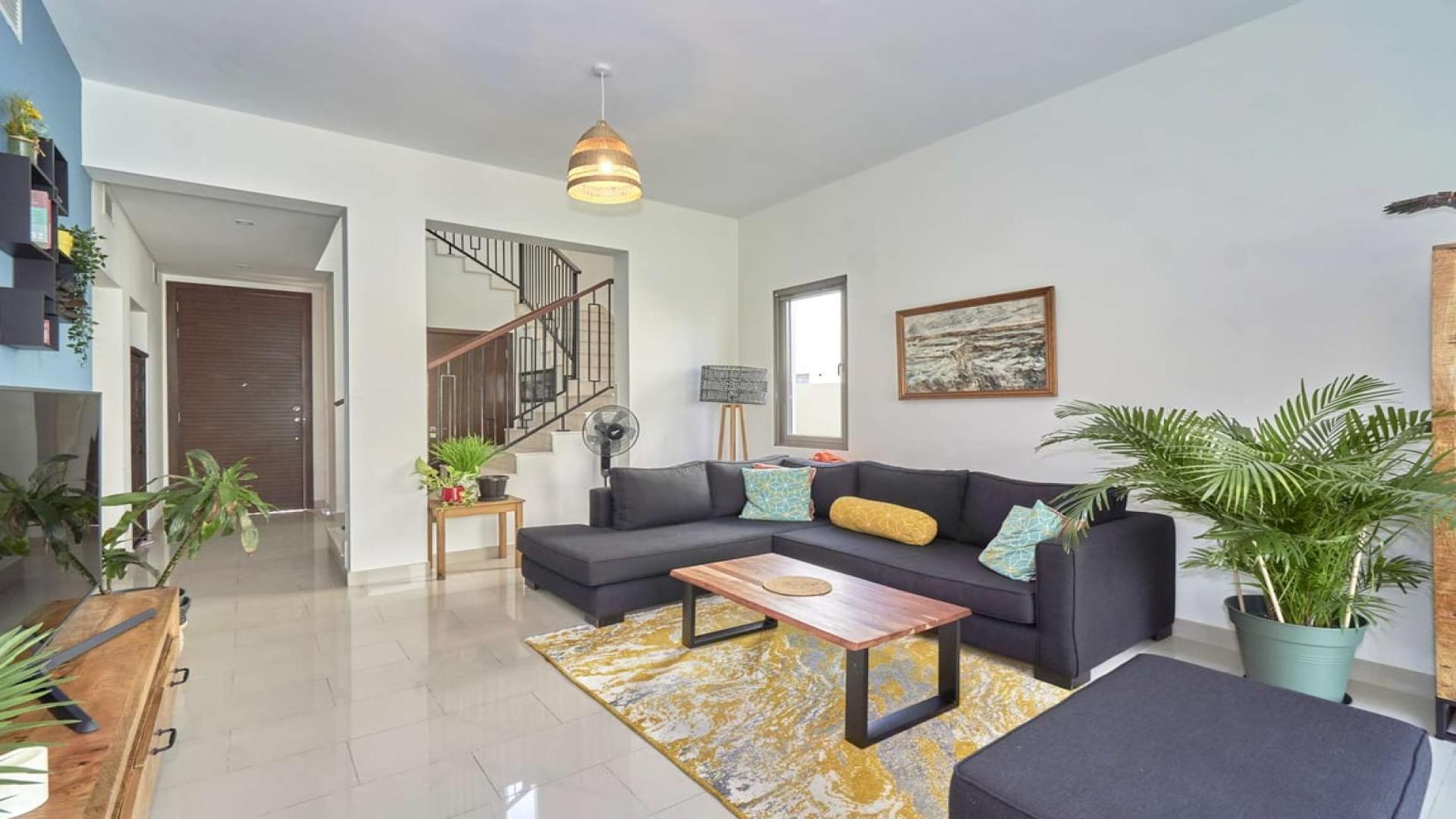 Brand new 3-bedroom villa living room with garden view in Azalea, Arabian Ranches 2