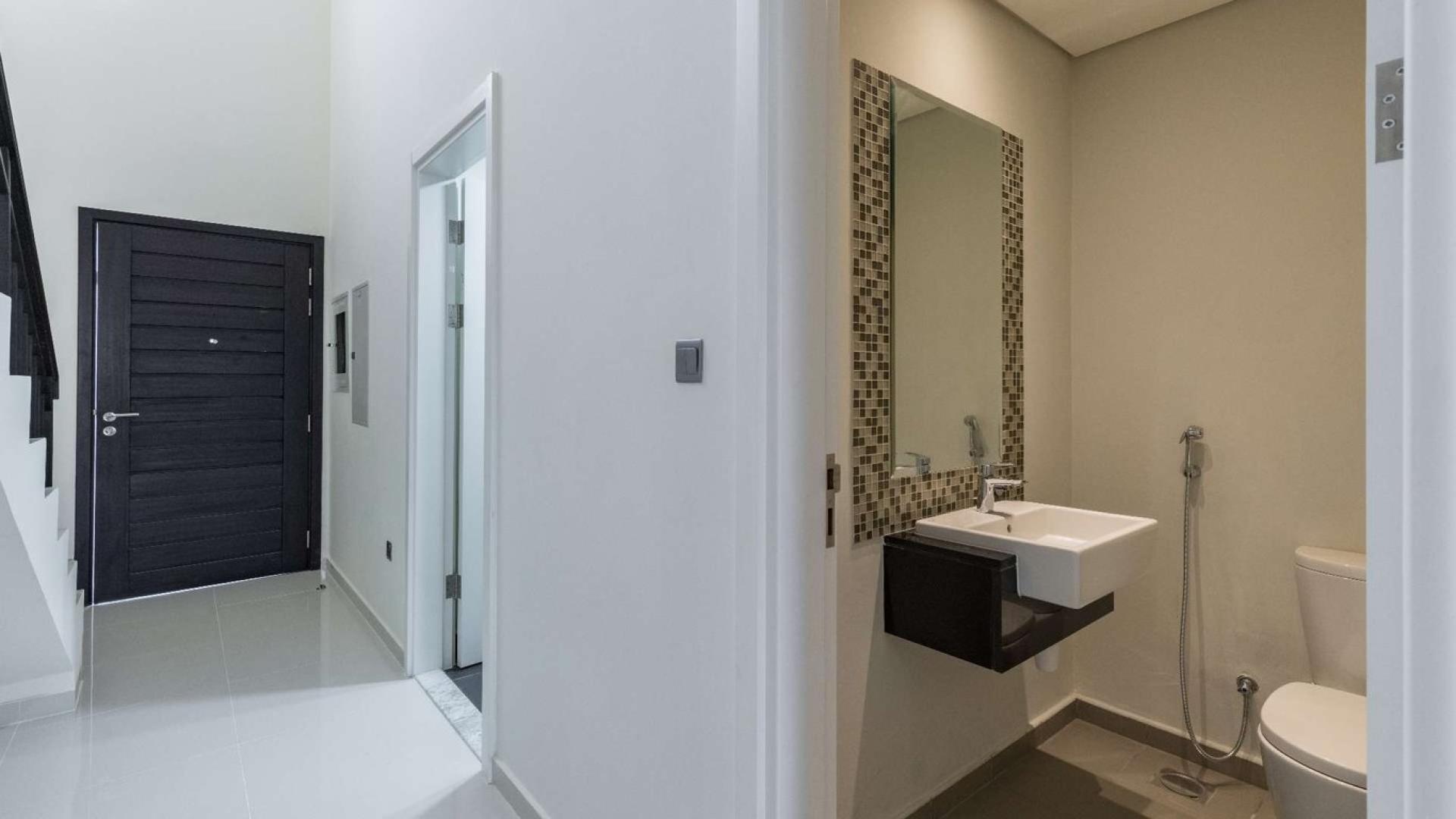 Furnished 3-bedroom townhouse exterior in Zinnia, Damac Hills 2, spacious layout for sale