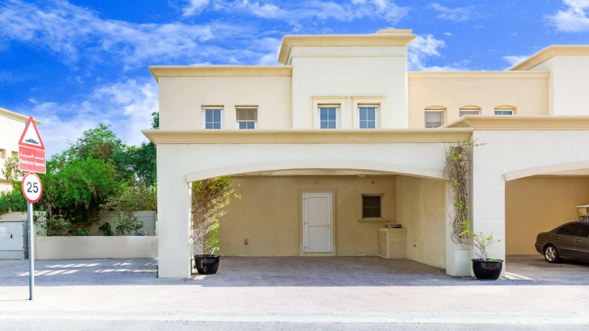 Spacious 3-bedroom villa exterior in The Springs, featuring carport and greenery. For sale