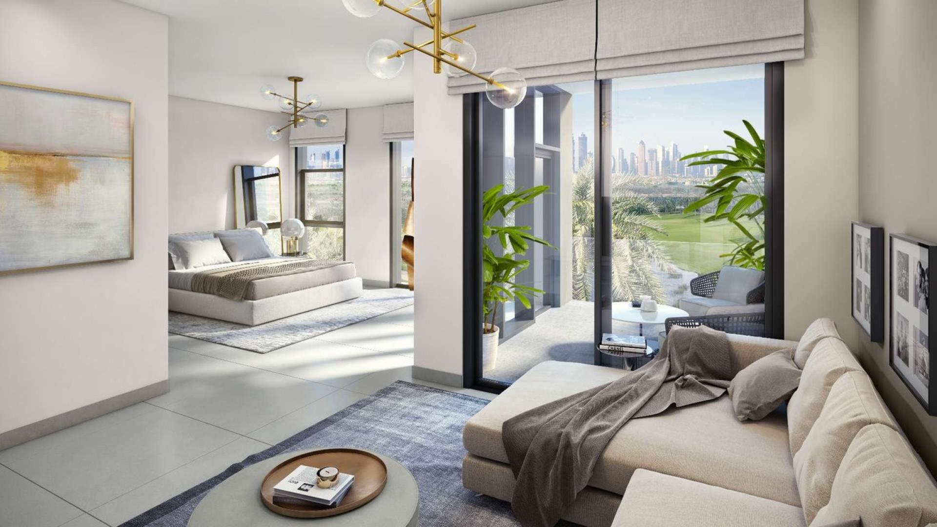 Modern living area in Dubai Hills Estate villa with skyline views through large windows