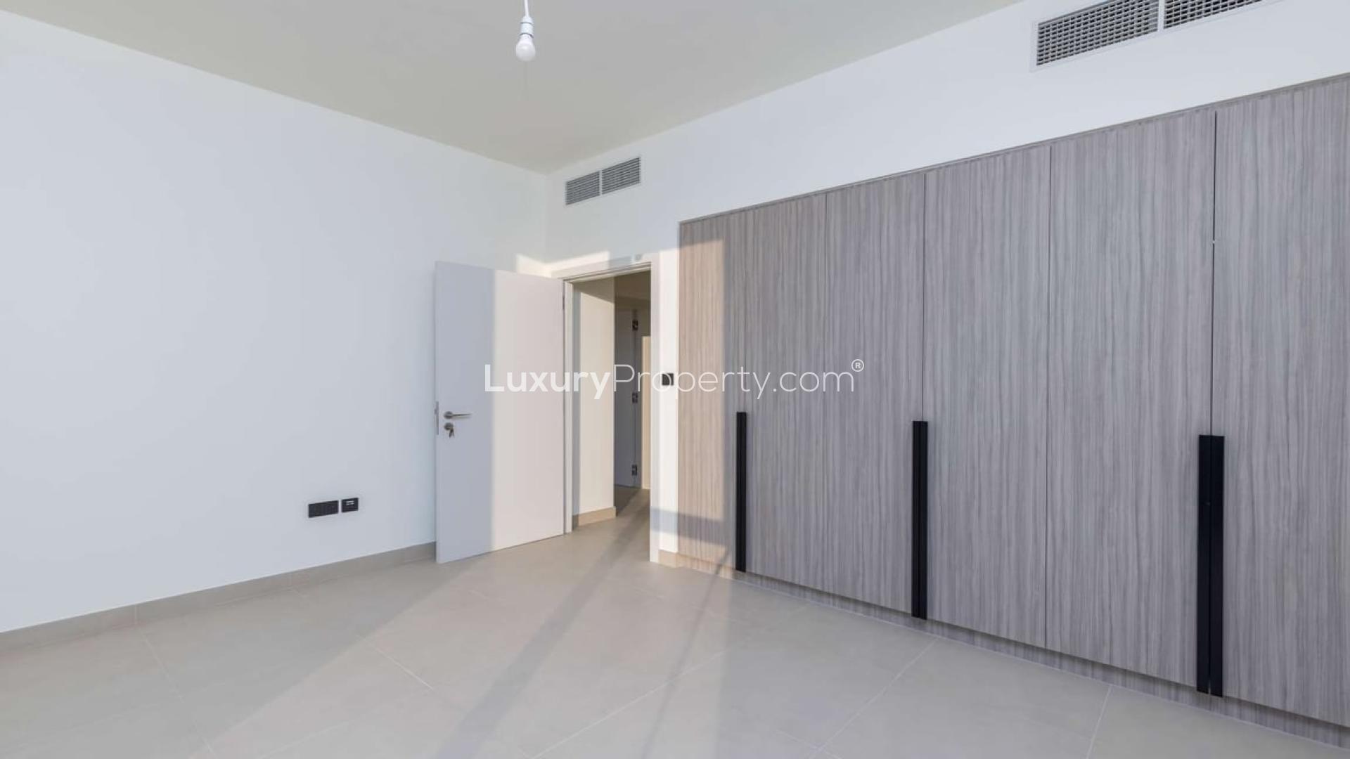 N/A,Empty bedroom with built-in wardrobes in Golf Grove villa, Dubai Hills Estate