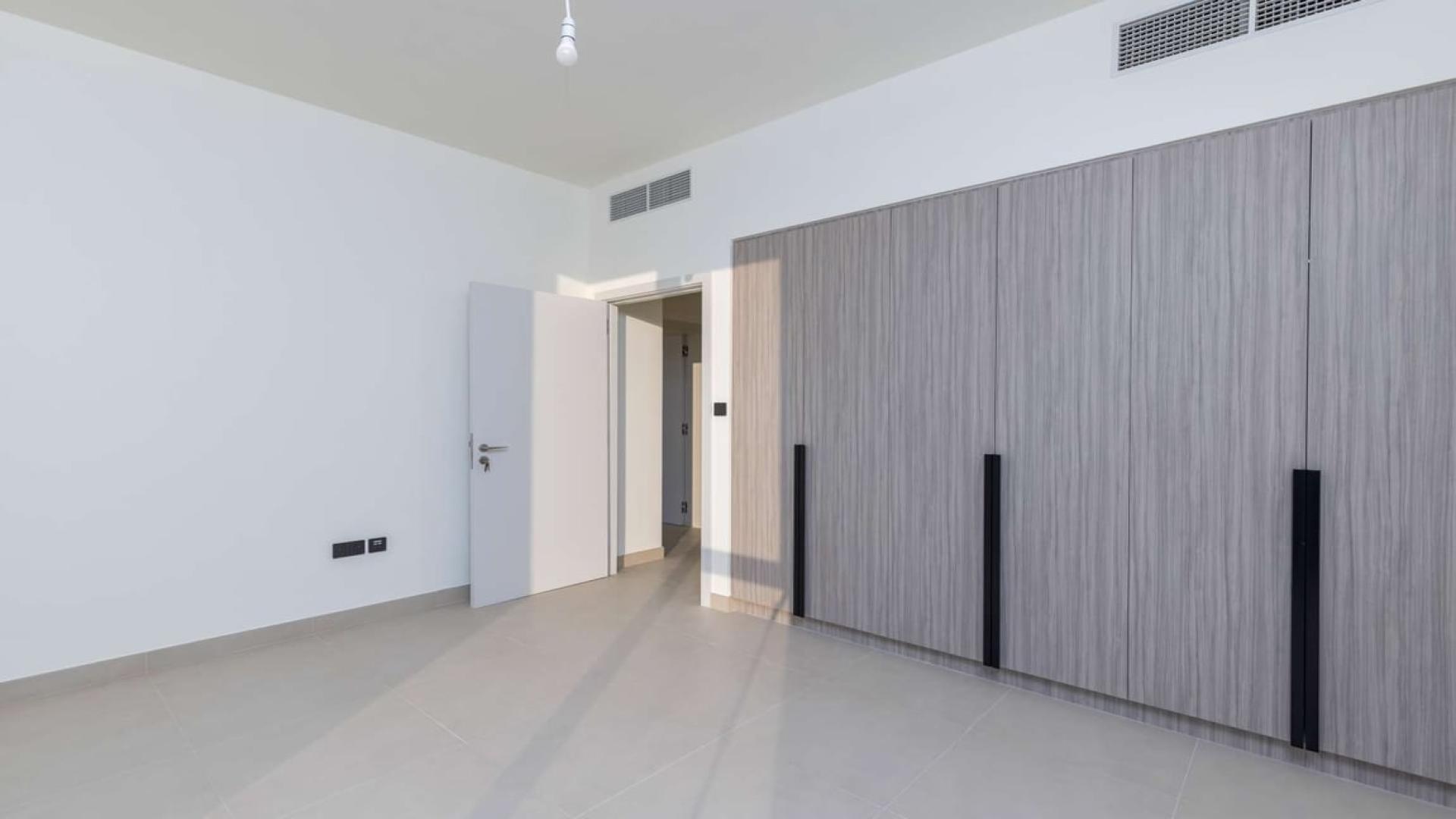 N/A,Empty bedroom with built-in wardrobes in Golf Grove villa, Dubai Hills Estate