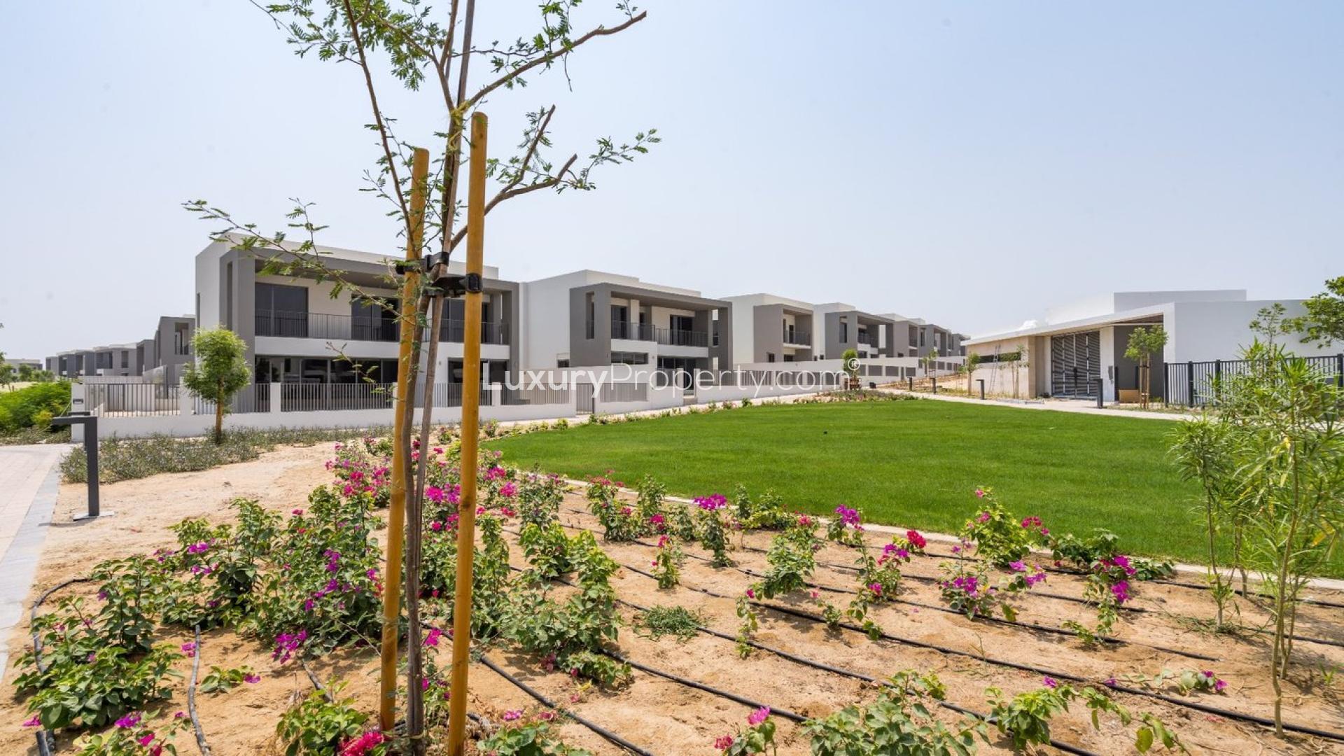 Outdoor pool view at Sidra Villas, Dubai Hills Estate, modern residential community for sale