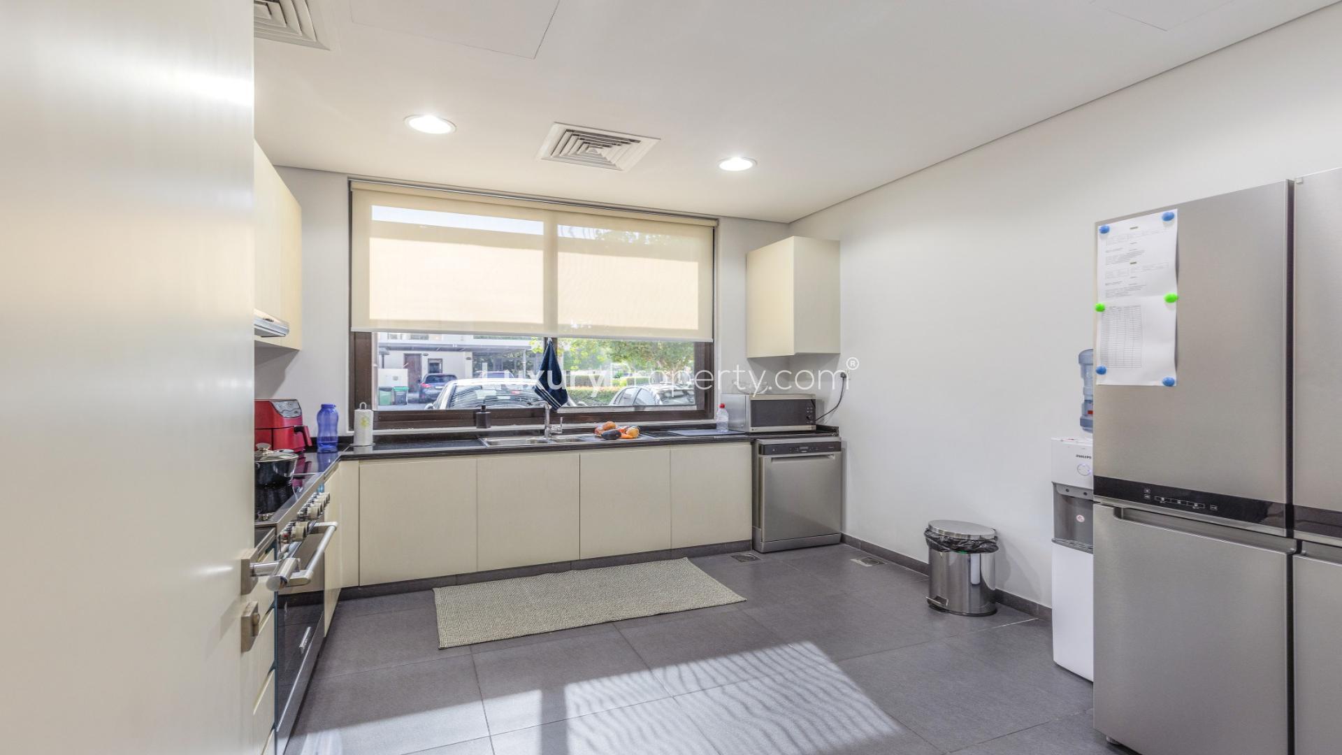 Modern dining and living area in upgraded villa, The Field, Damac Hills