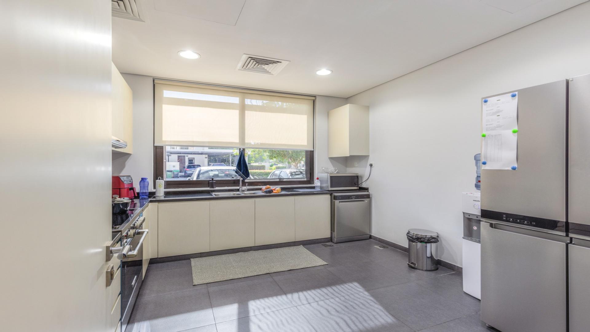 Modern dining and living area in upgraded villa, The Field, Damac Hills