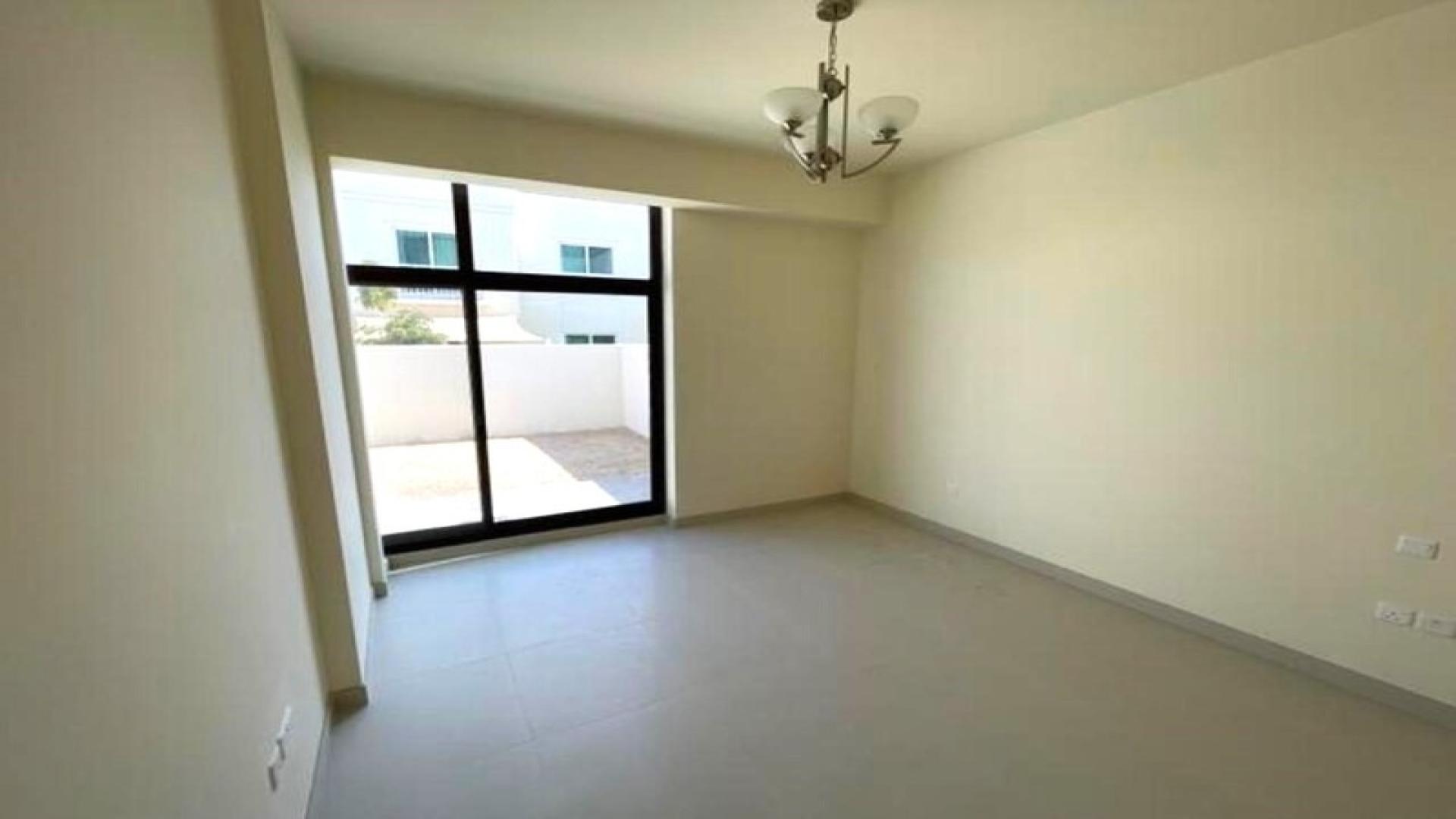 Bright living room with large windows in District 11 villa, Mohammed Bin Rashid City