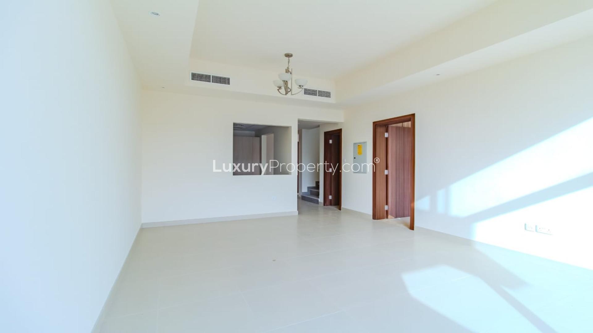 Spacious living area with high ceilings in District 11 villa, Mohammed Bin Rashid City