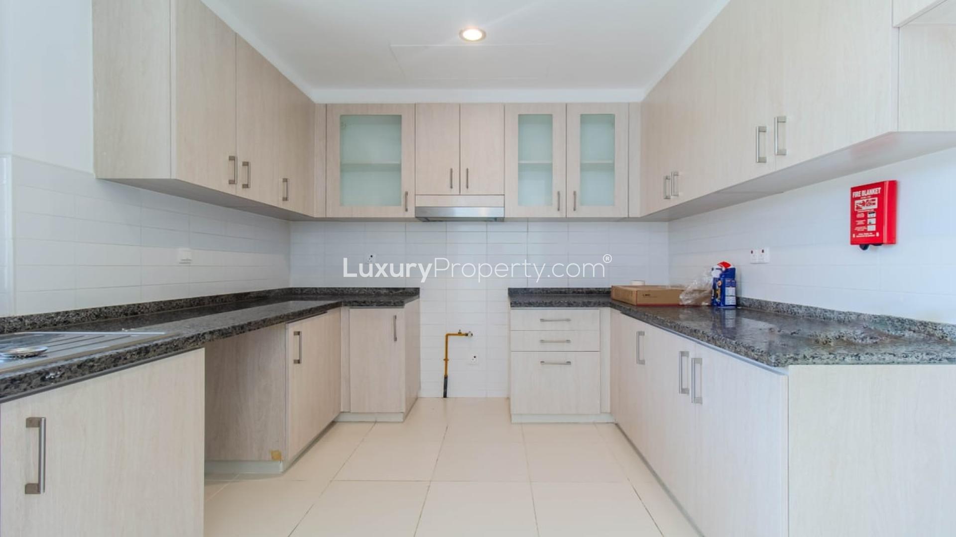 Modern kitchen in a 3-bedroom villa for sale, Mira Oasis, Reem community