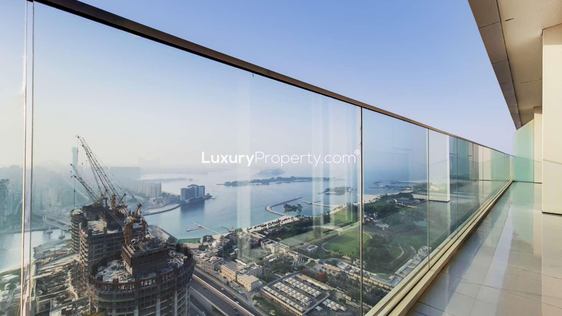 Luxurious Dubai Media City apartment living room with modern decor and full-length windows