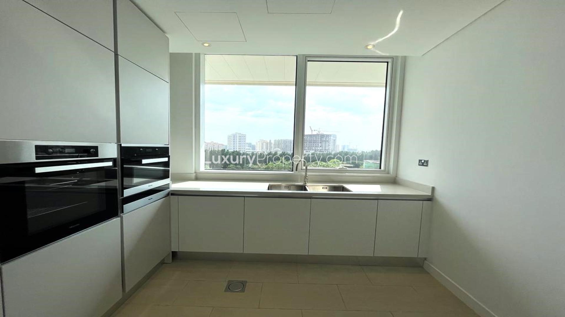 Spacious open-plan kitchen and living area in Al Barari, Seventh Heaven apartment for rent