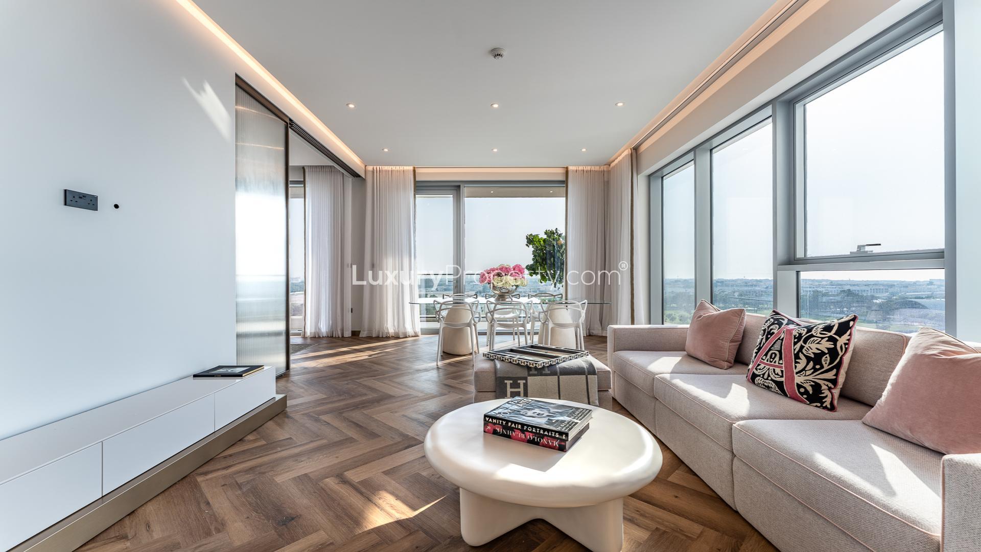 Modern living room with large windows, stylish decor in Canal Front Residences, Dubai Water Canal