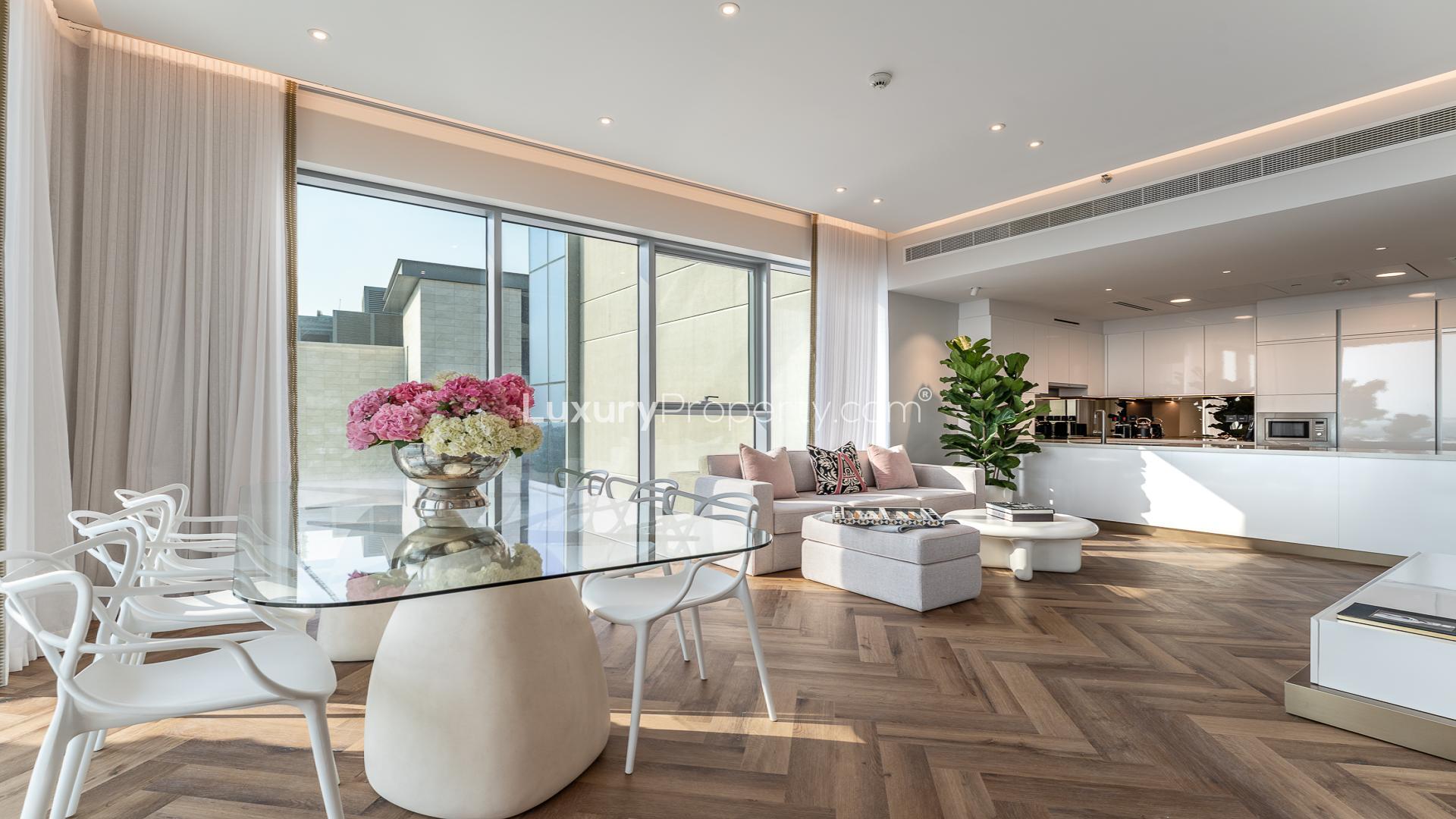 Modern living room with large windows, stylish decor in Canal Front Residences, Dubai Water Canal