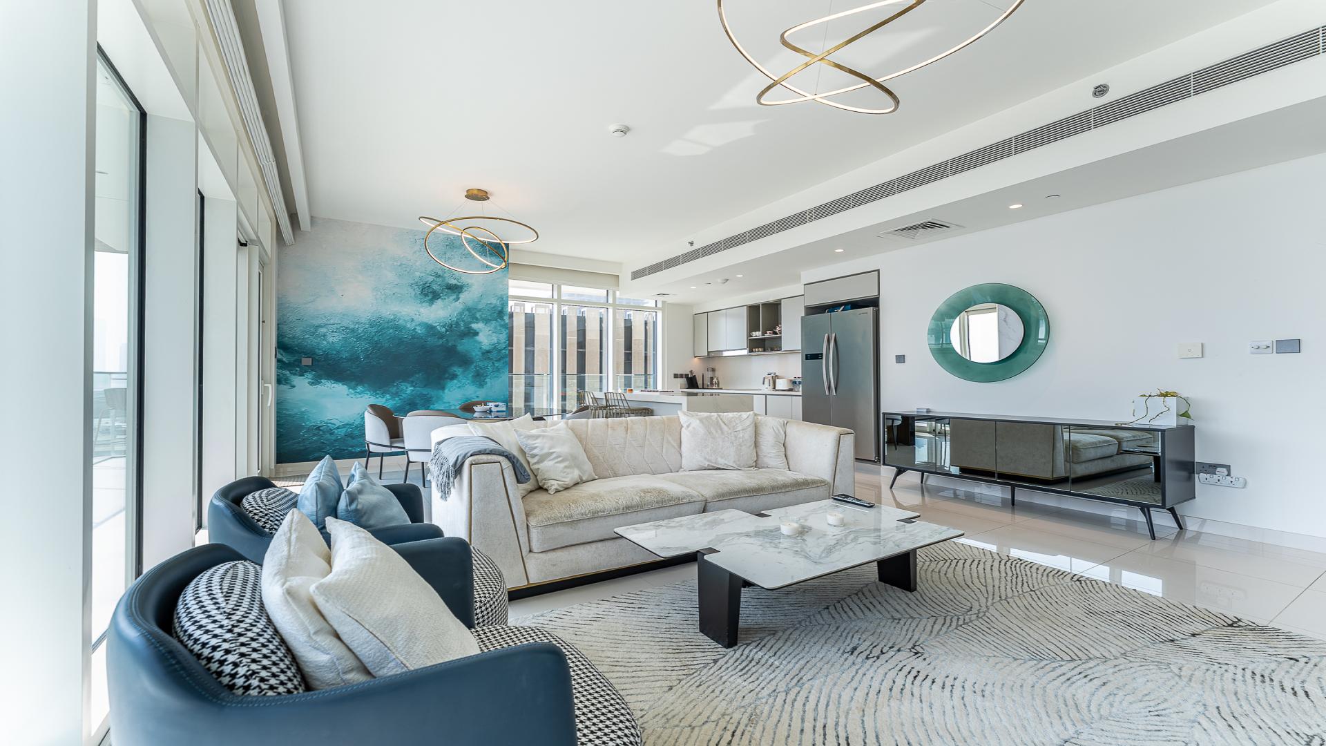 "Spacious balcony view from 3-bedroom apartment at Sunrise Bay, Emaar Beach Front, Dubai.",Furnished living room in 3-bedroom apartment, Sunrise Bay, Emaar Beach Front, Dubai