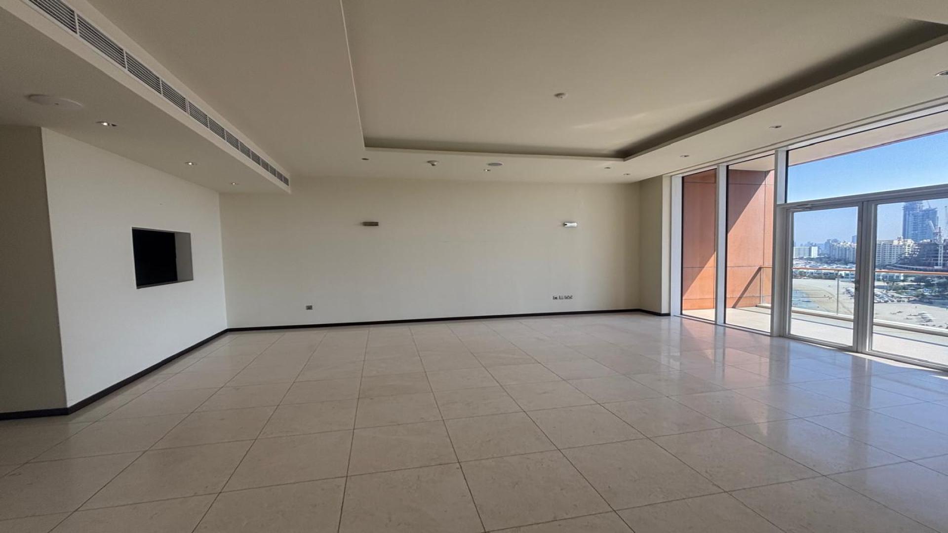 Balcony view of Palm Jumeirah beach and skyline from Tiara Residences apartment for rent