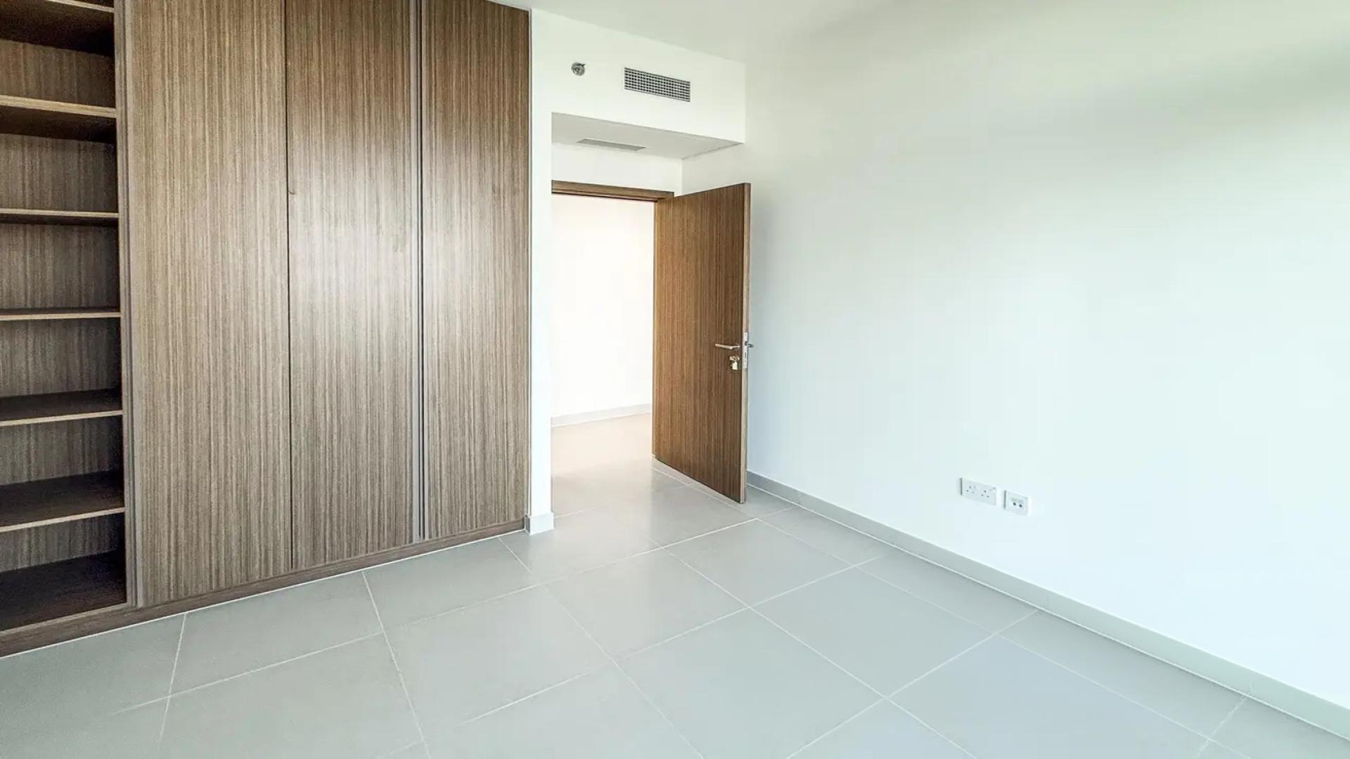 "Spacious high-floor apartment with balcony and water views in Dubai Creek Harbour for rent.",Brand new apartment interior with built-in wardrobe in Dubai Creek Harbour, Palace Residence North