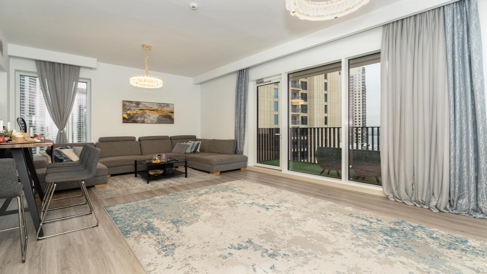 Creek Horizon Tower 1 skyline view in Dubai Creek Harbour with lush green park