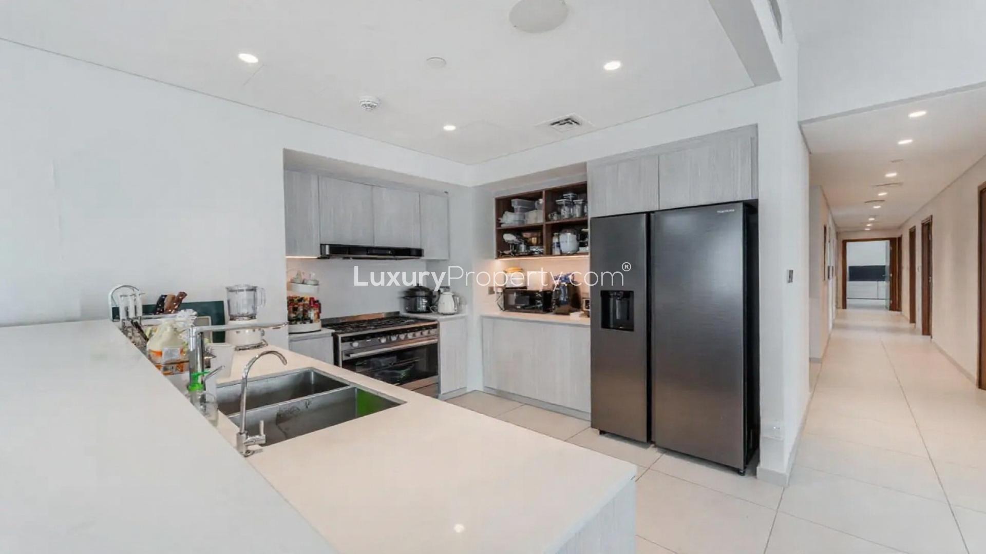 Modern kitchen in luxury 3-bedroom apartment for rent at Vida Creek Harbour, Creek Beach