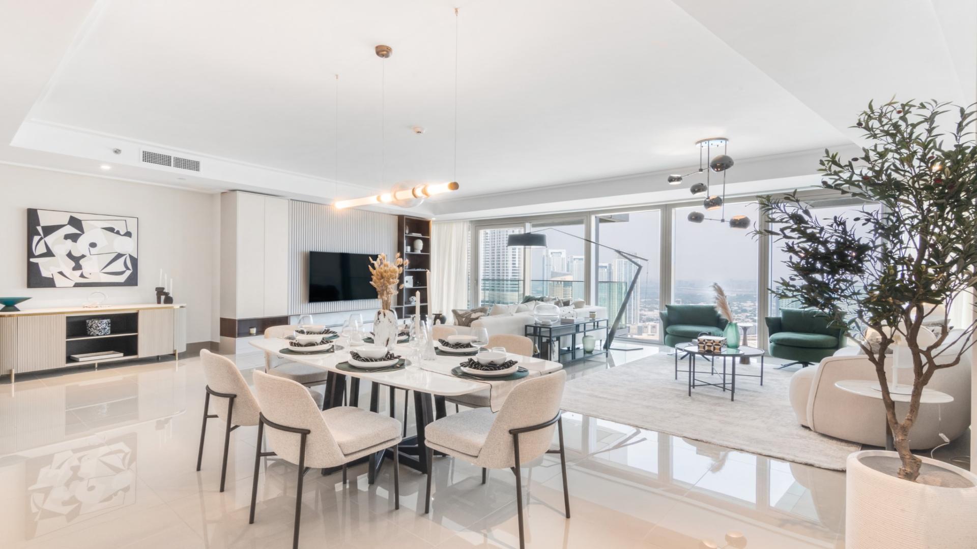 Modern living room in Opera Grand apartment, Downtown. Bright, spacious, with city views. Rent