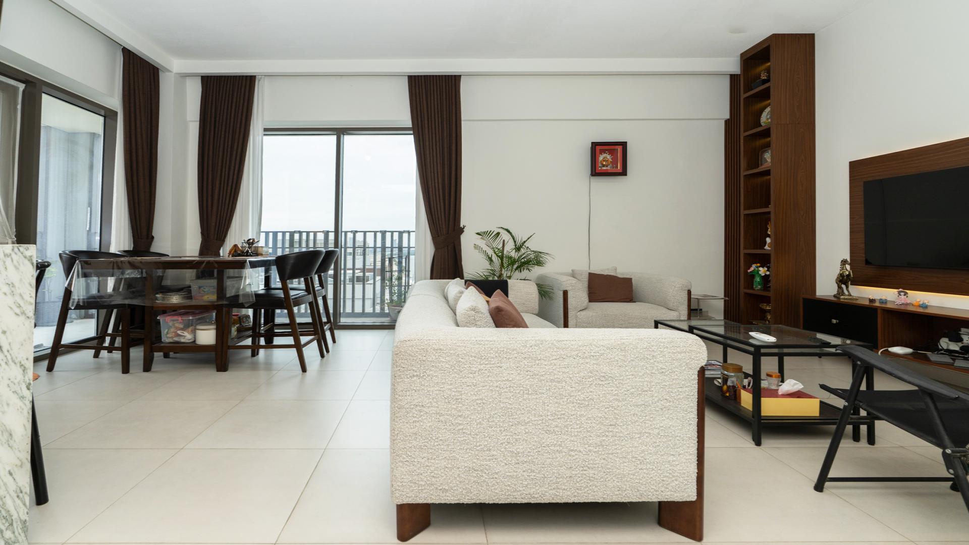 Modern living room in upgraded high-floor apartment, Dubai Creek Harbour, available for rent
