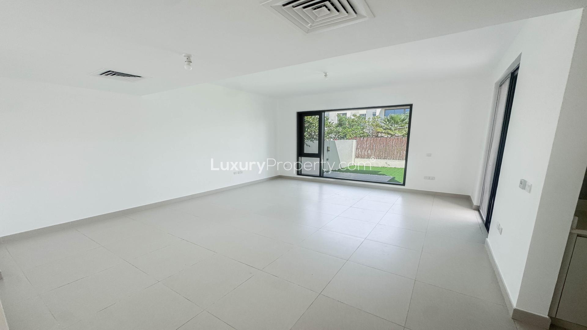 Exterior view of landscaped apartment in Dubai Hills Estate, Maple community, for rent