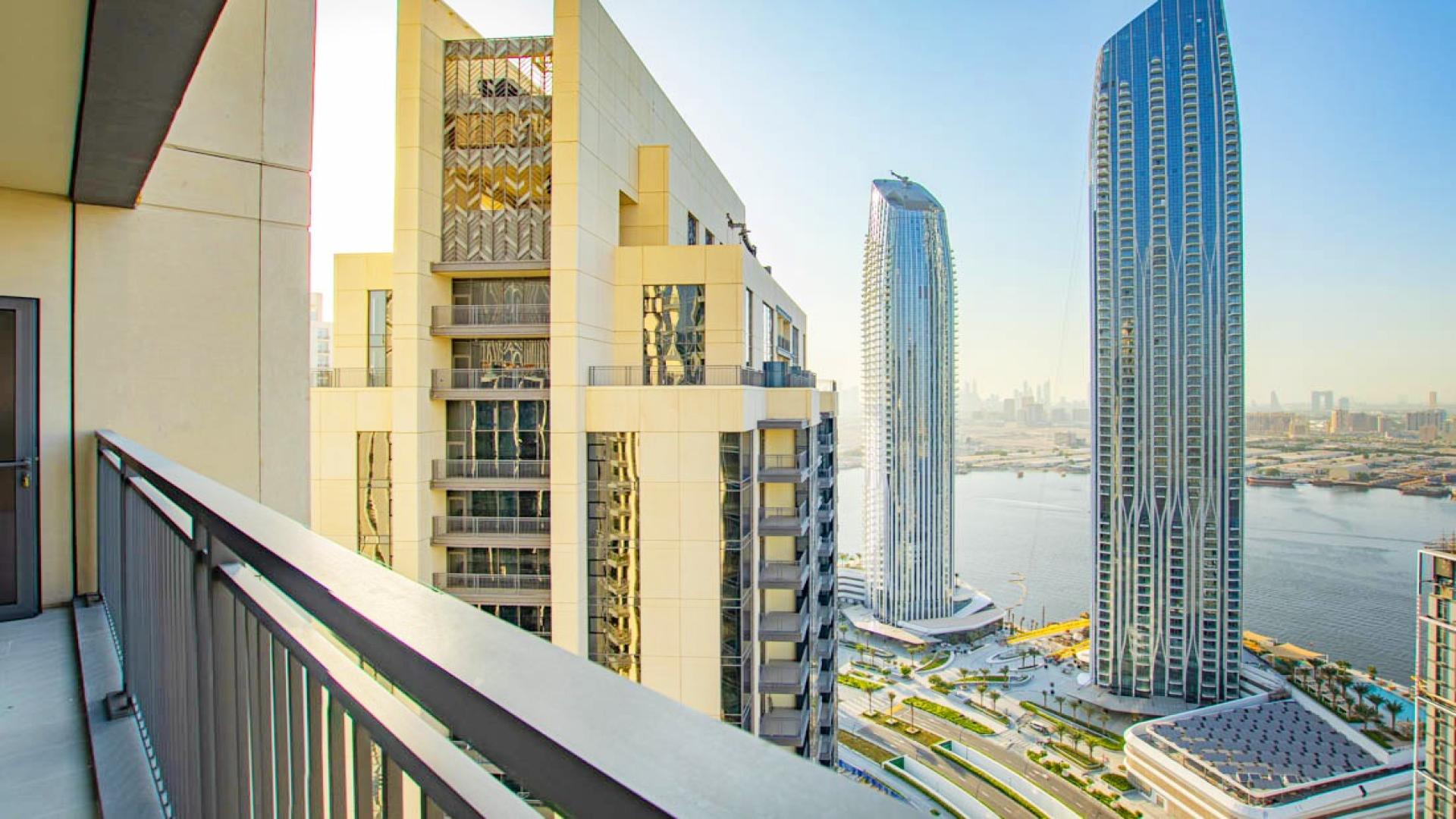 High-floor apartment view of Dubai Creek Harbour skyline and waterfront in Creek Rise Tower