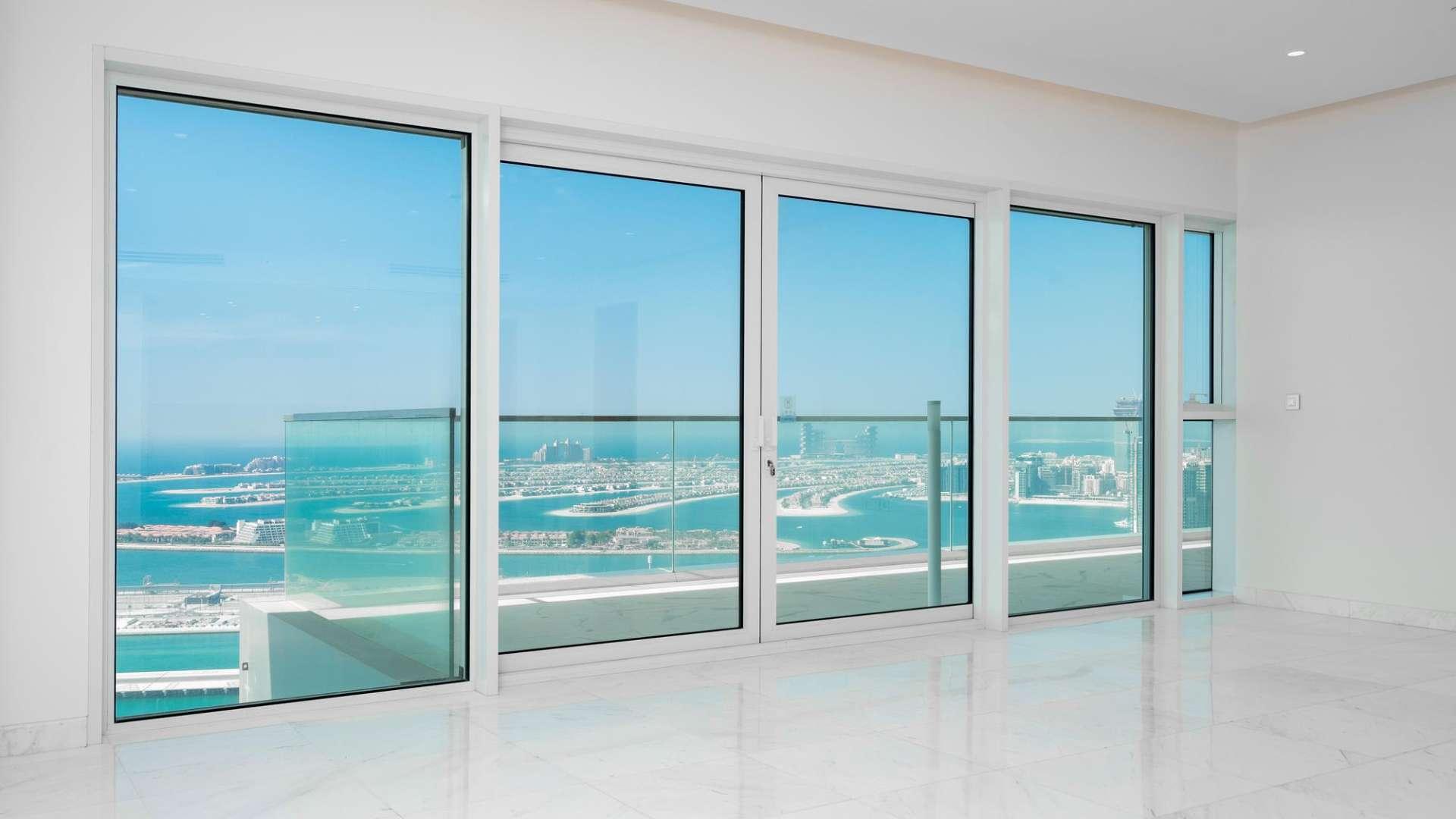 Luxurious beachfront apartment balcony view at 1 JBR, Dubai overlooking blue sea