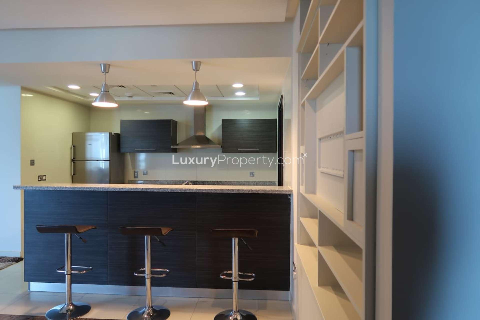 Modern kitchen and dining area in 3-bedroom apartment, 23 Marina, Dubai Marina