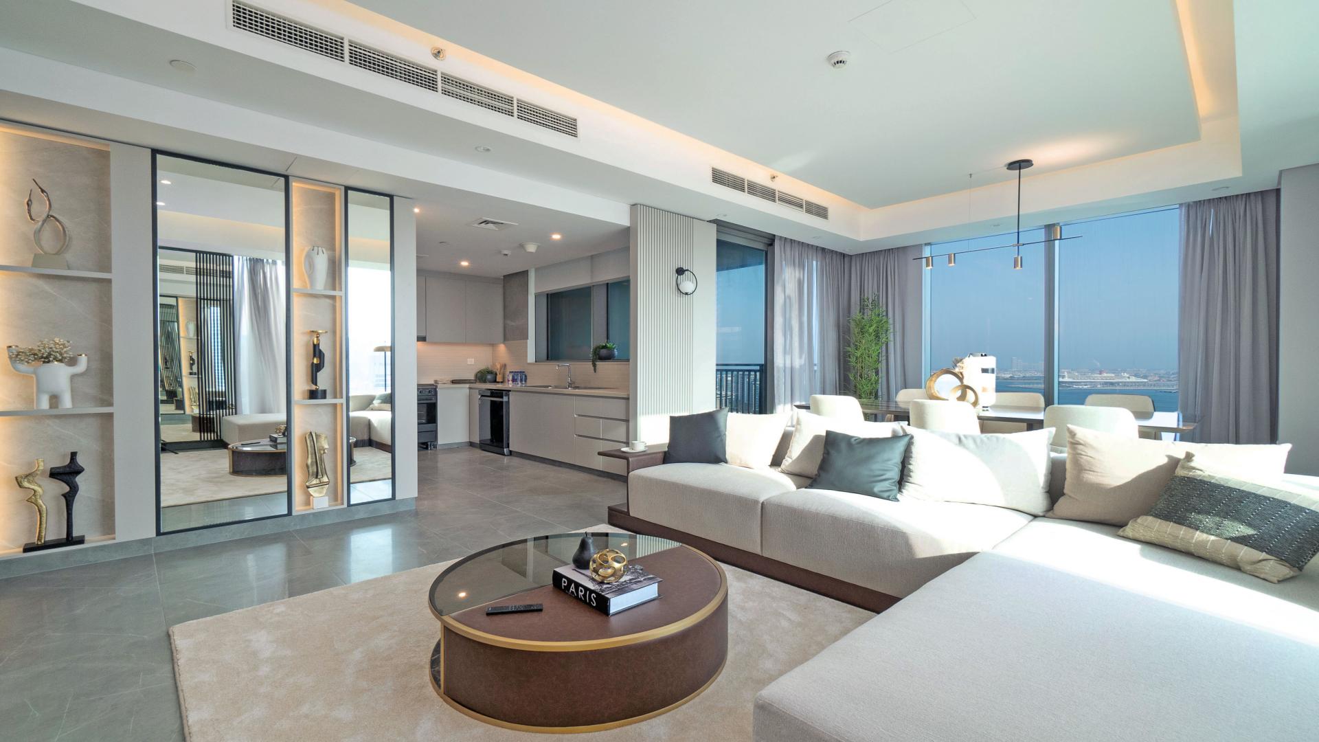 Immaculate Dubai Marina apartment living room with modern decor and stunning sea view