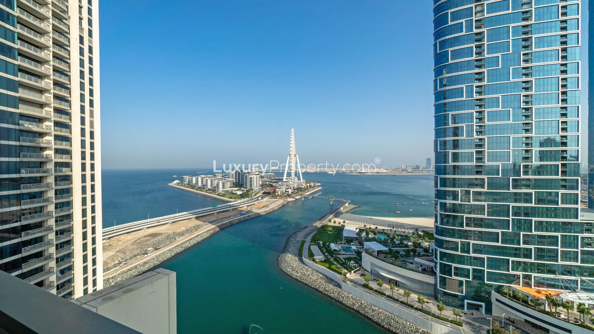 Modern living room in 3-bedroom Dubai Marina apartment with elegant decor and natural light