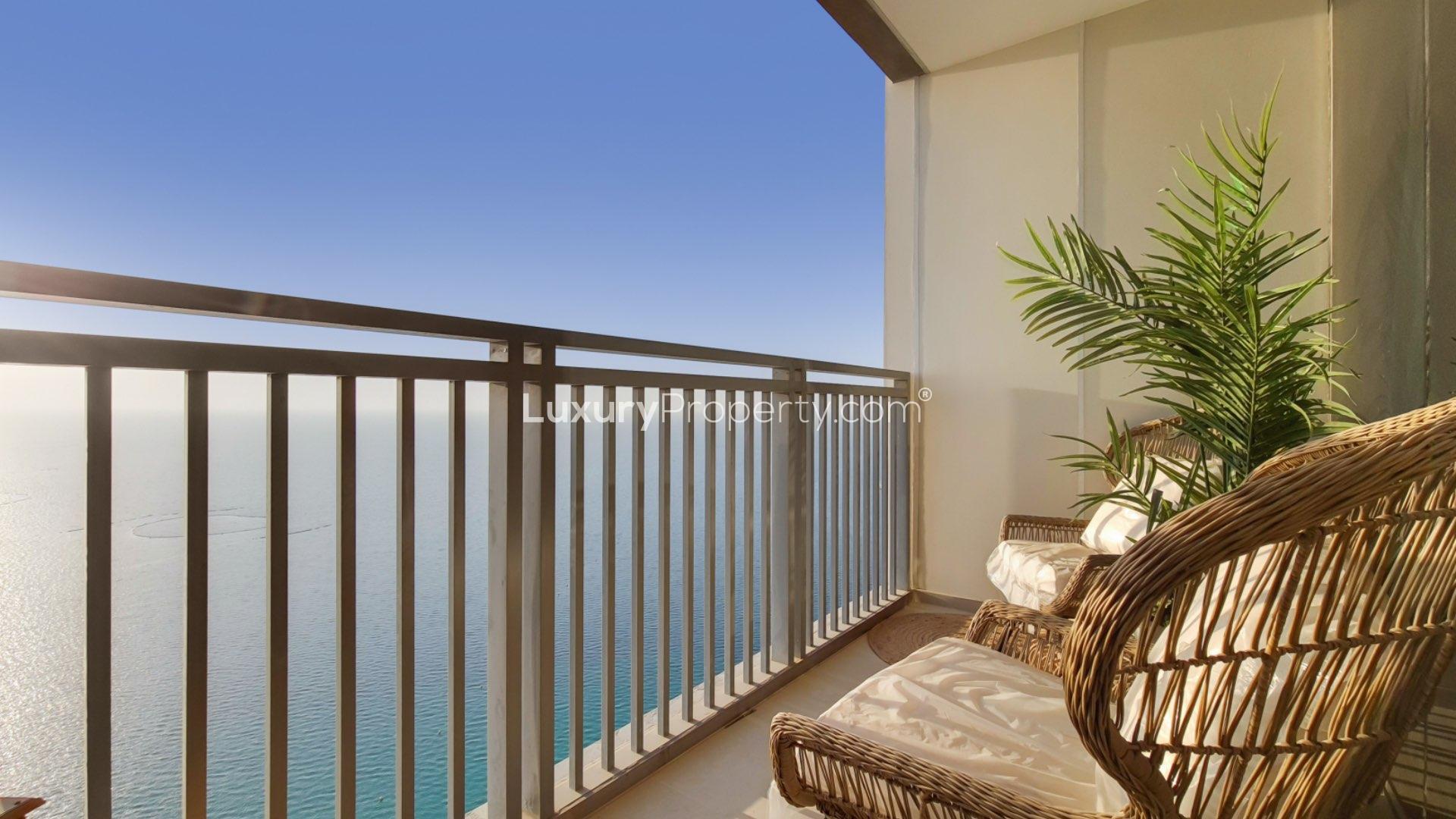 Luxurious living room in 3-bedroom apartment, Dubai Marina, with sea views and modern decor