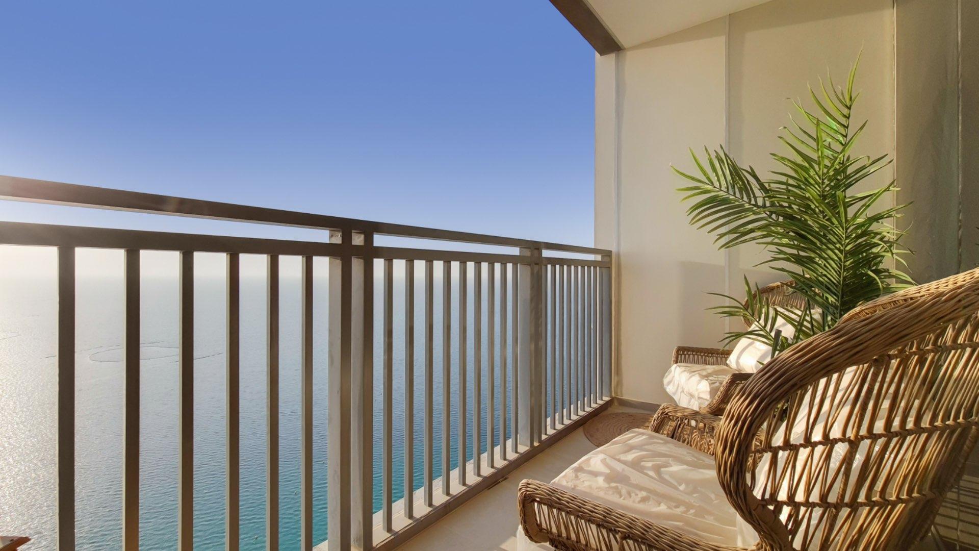 Luxurious living room in 3-bedroom apartment, Dubai Marina, with sea views and modern decor