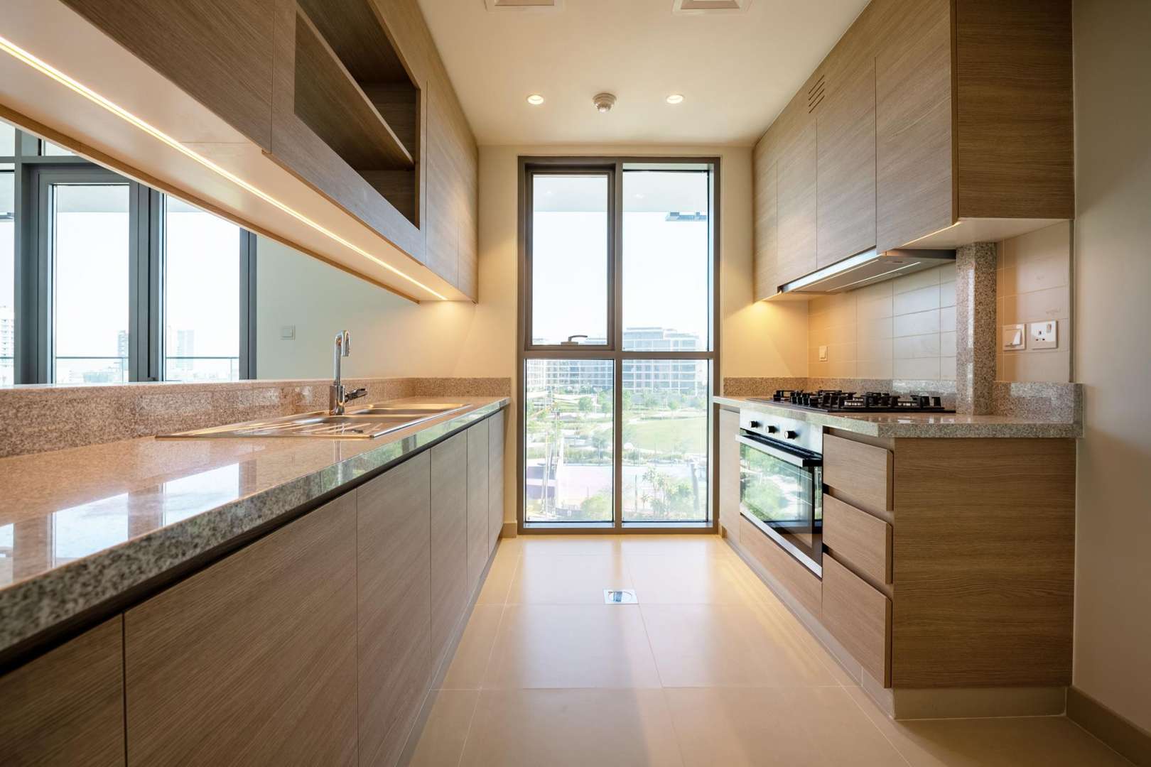 Luxurious open-plan living area in Acacia Park Heights apartment, Dubai Hills Estate