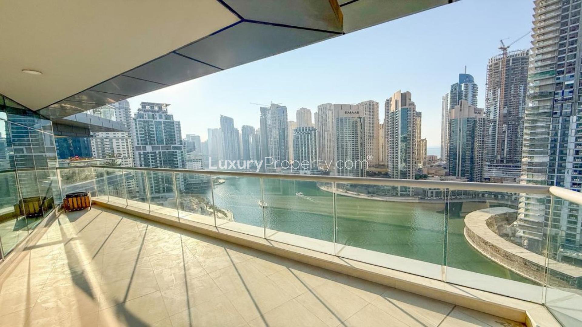 Spacious living room in Trident Bayside apartment, Dubai Marina, featuring modern decor and furniture
