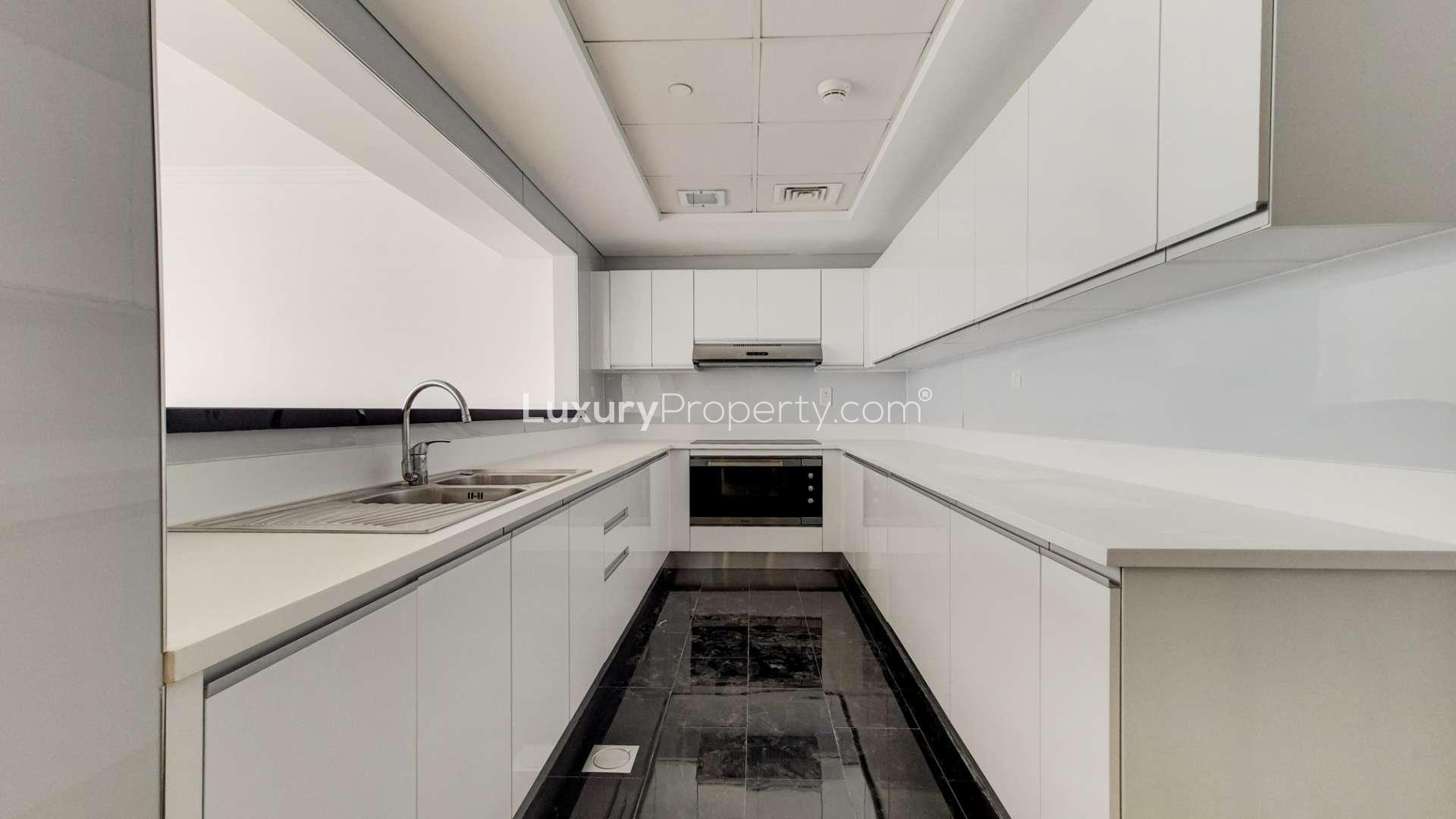 High floor apartment living area with open kitchen, Al Bateen Residences, Jumeirah Beach Residence