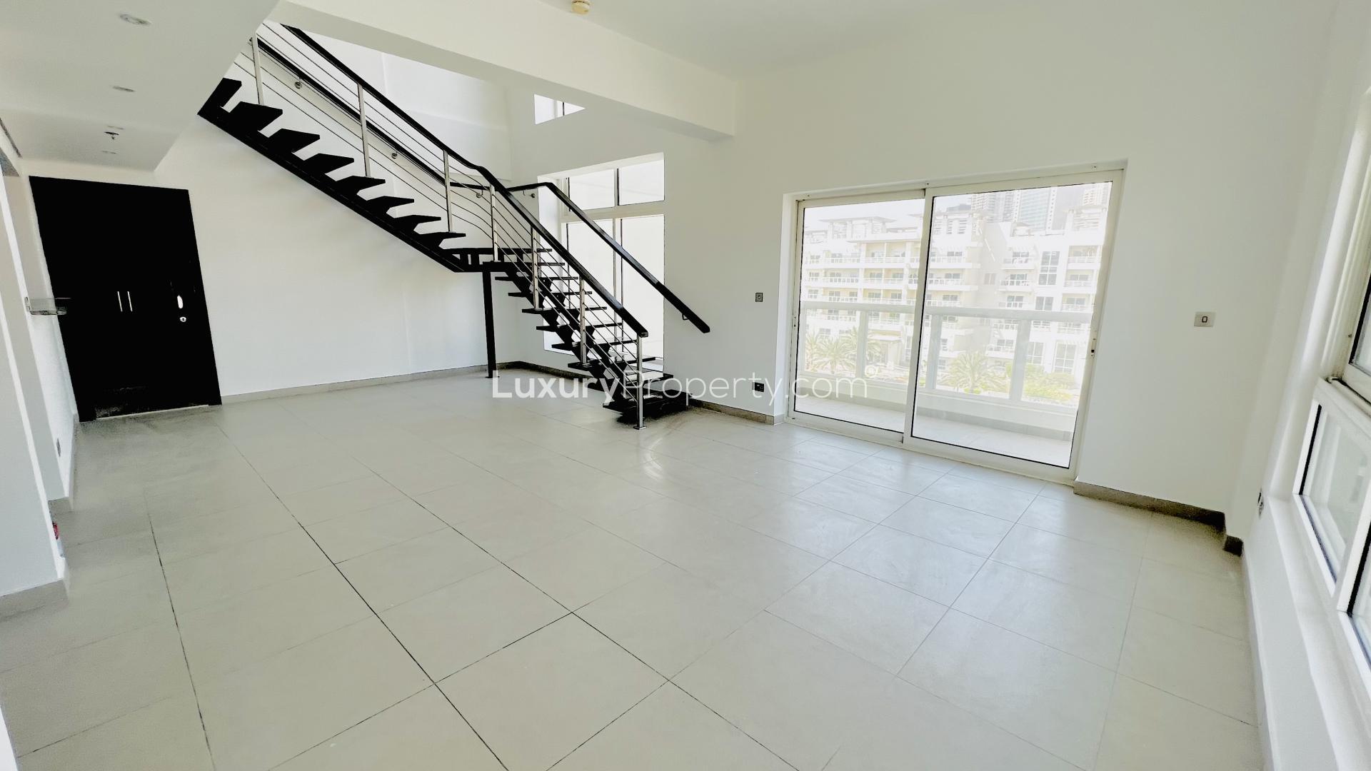 Luxurious poolside view at Jumeirah Heights Cluster A apartment complex