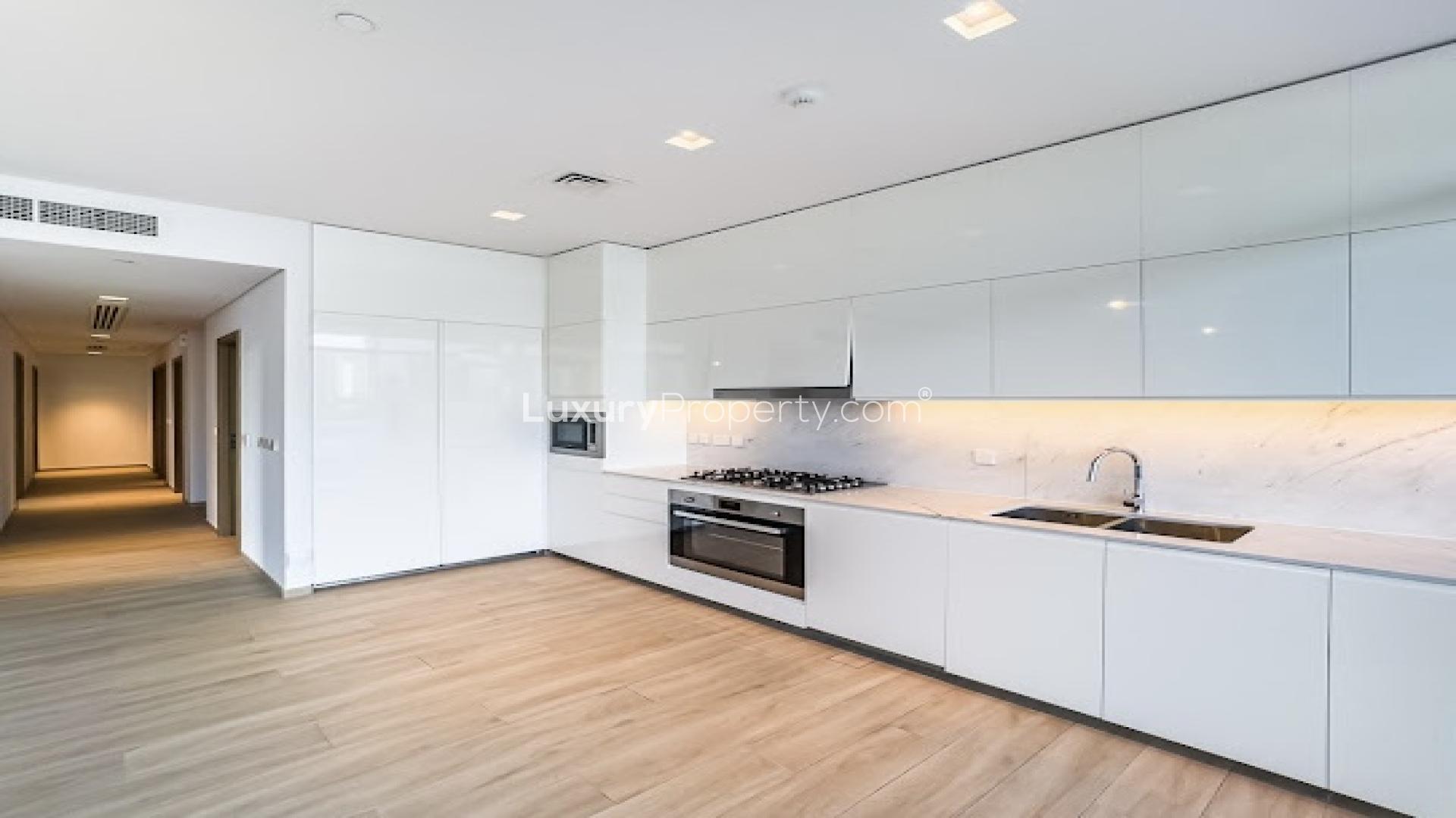 Spacious living room with lagoon view in Dubai Creek Harbour apartment for rent