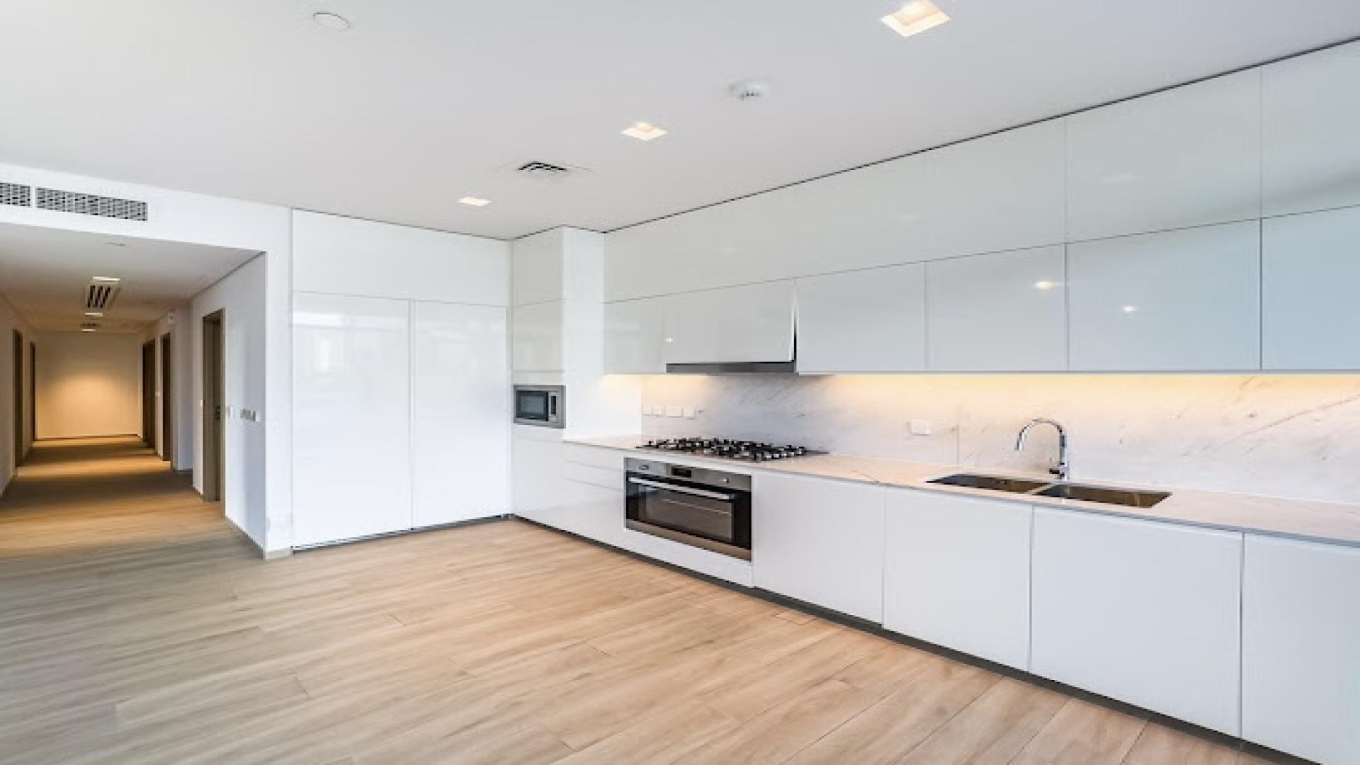 Spacious living room with lagoon view in Dubai Creek Harbour apartment for rent