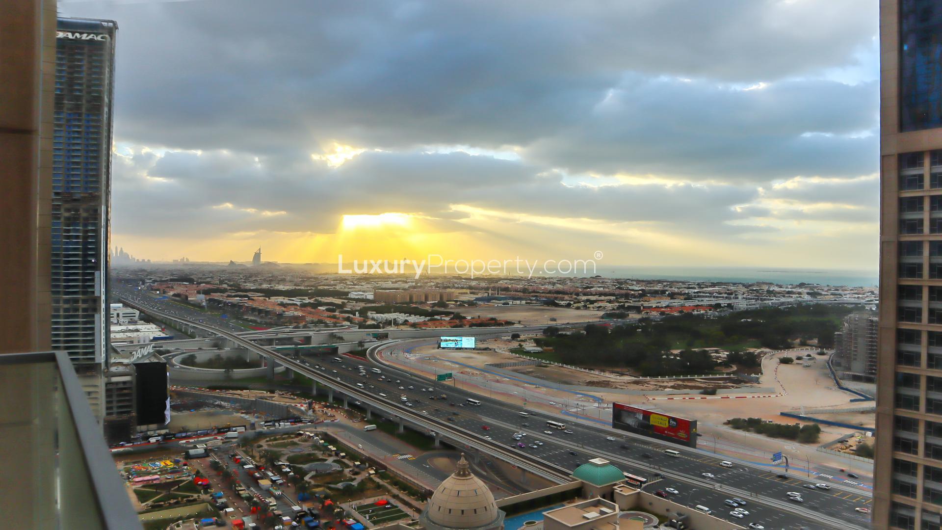Bright living room with marble flooring in Business Bay apartment for rent, Al Habtoor City