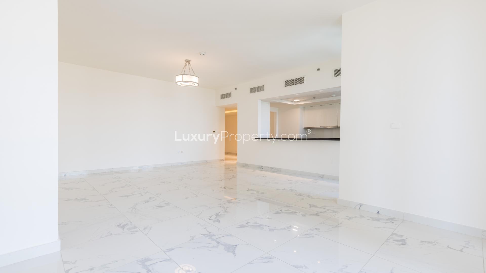Spacious living area with marble flooring in Al Habtoor City apartment, Business Bay
