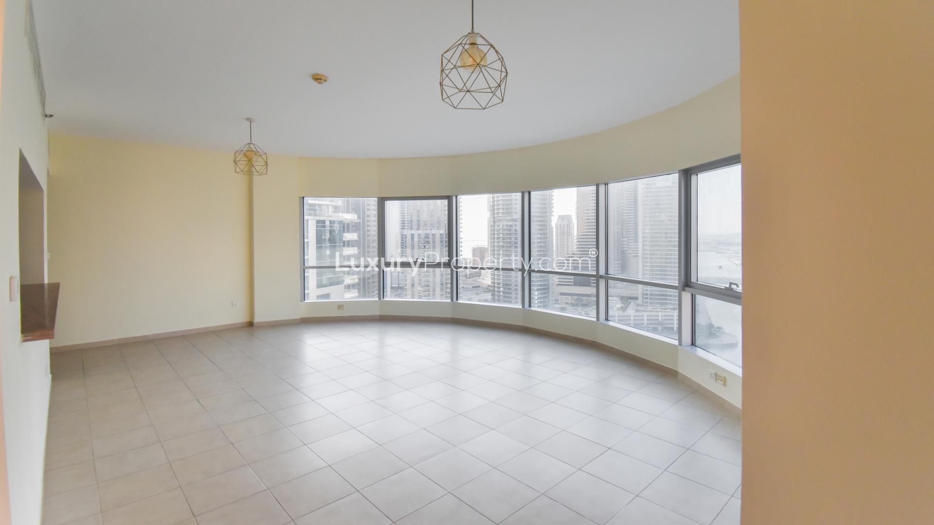 Spacious living room with panoramic city views in Al Habtoor Tower, Business Bay apartment