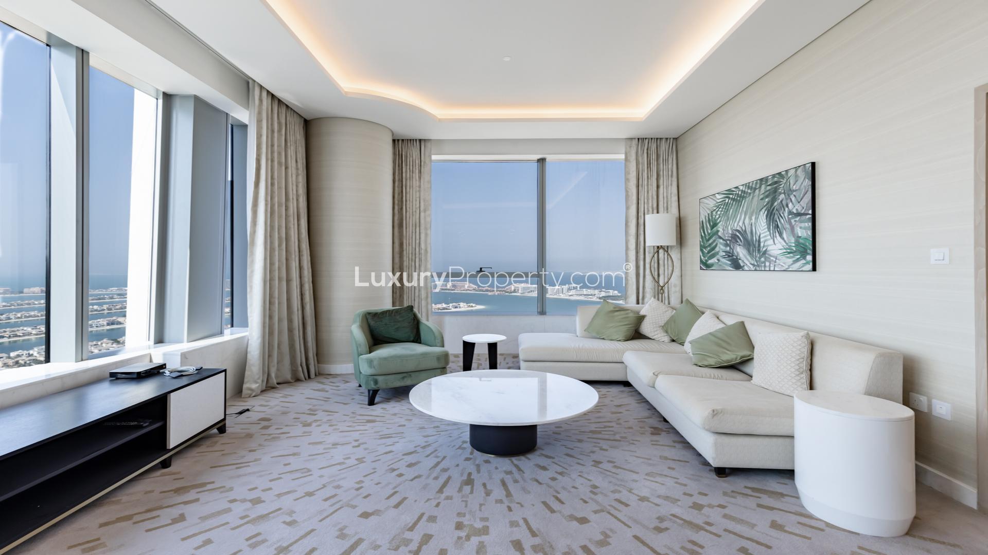 Luxurious Palm Jumeirah apartment interior with Burj Al Arab view, modern decor, spacious living