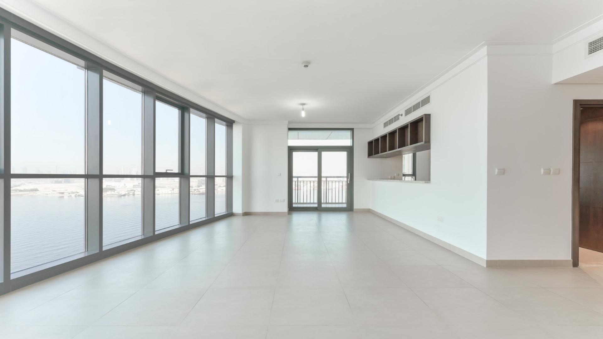 Spacious living room with large windows, Dubai Creek Harbour apartment for rent, Ref No: LP47283