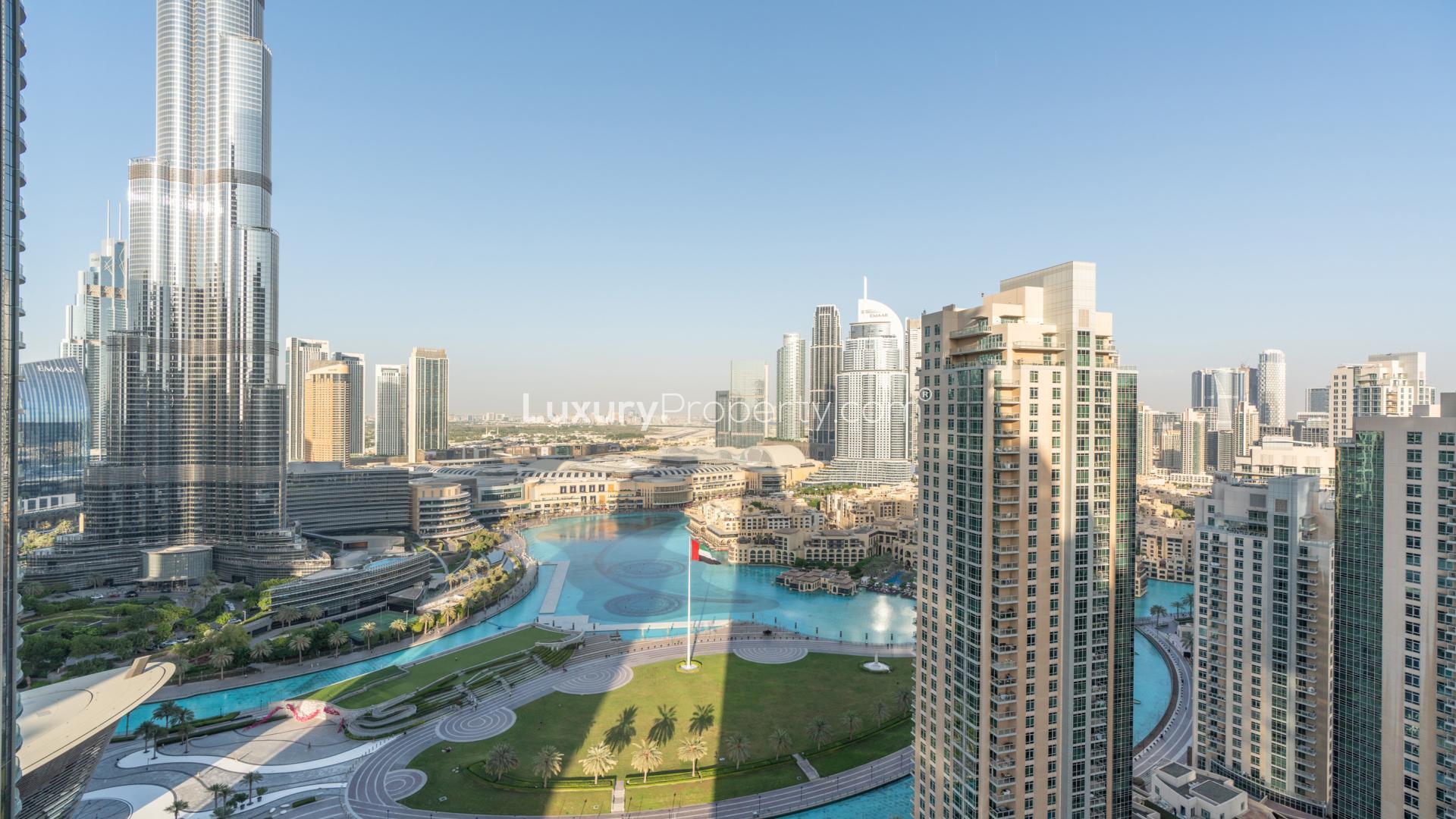 Luxurious living room in Opera Grand apartment, Downtown Dubai, featuring modern decor and lighting
