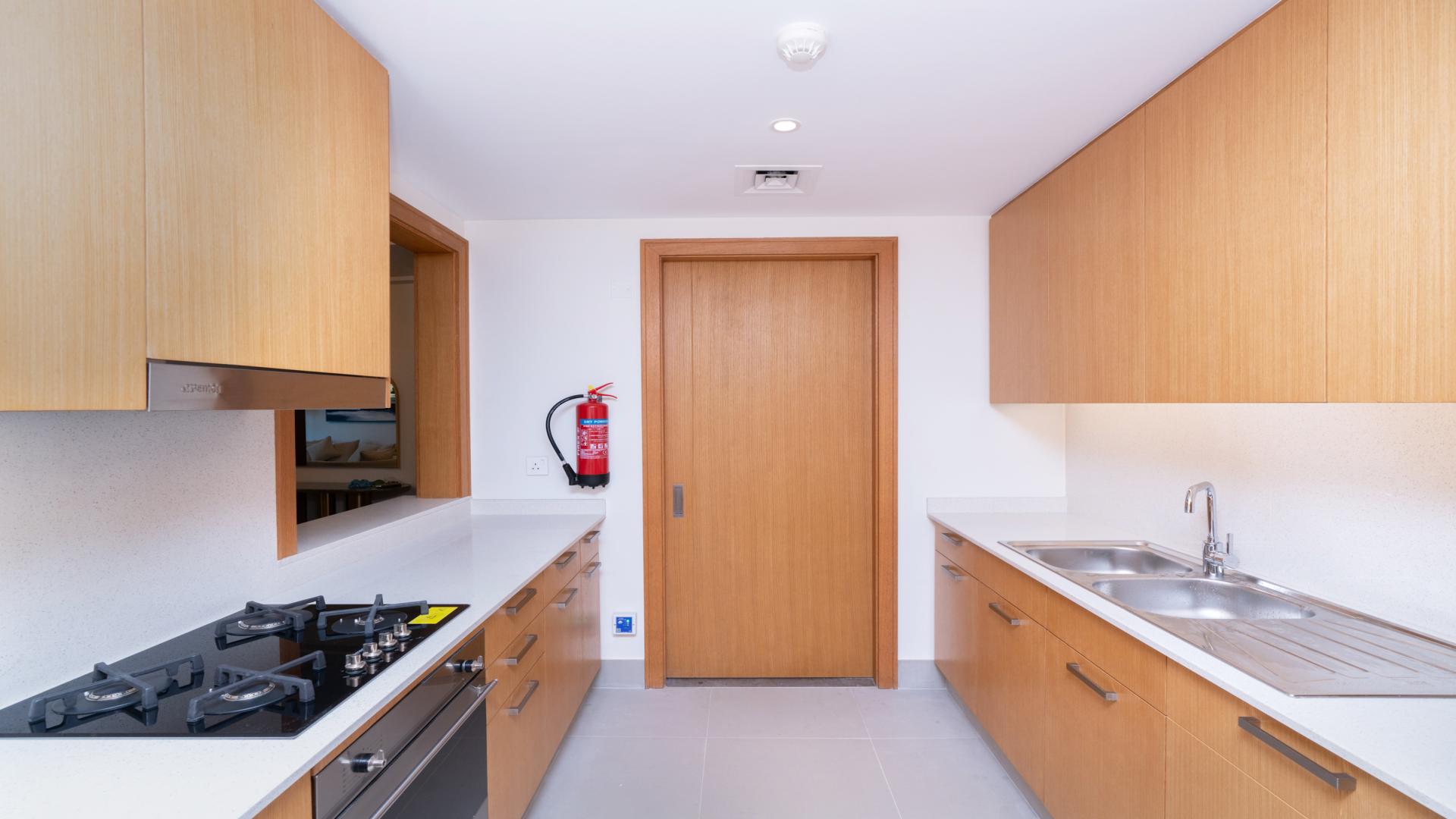 Stylish living room in Opera Grand apartment, Downtown Dubai, with modern furnishings and city view