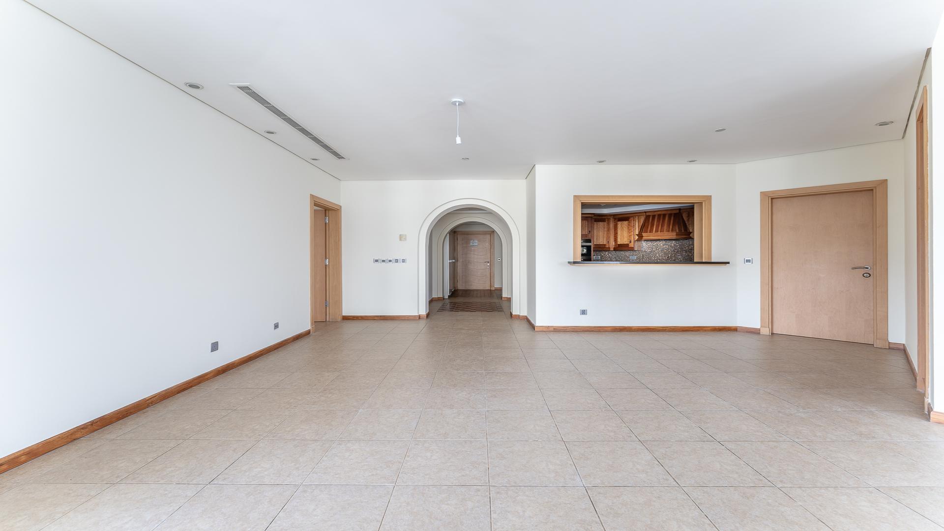 Sea view from Shoreline Apartments, Palm Jumeirah, featuring private beach and lush gardens