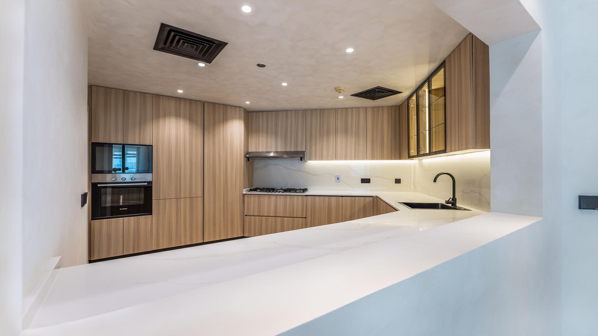 Vacant upgraded apartment interior with large windows, Shoreline Apartments, Palm Jumeirah